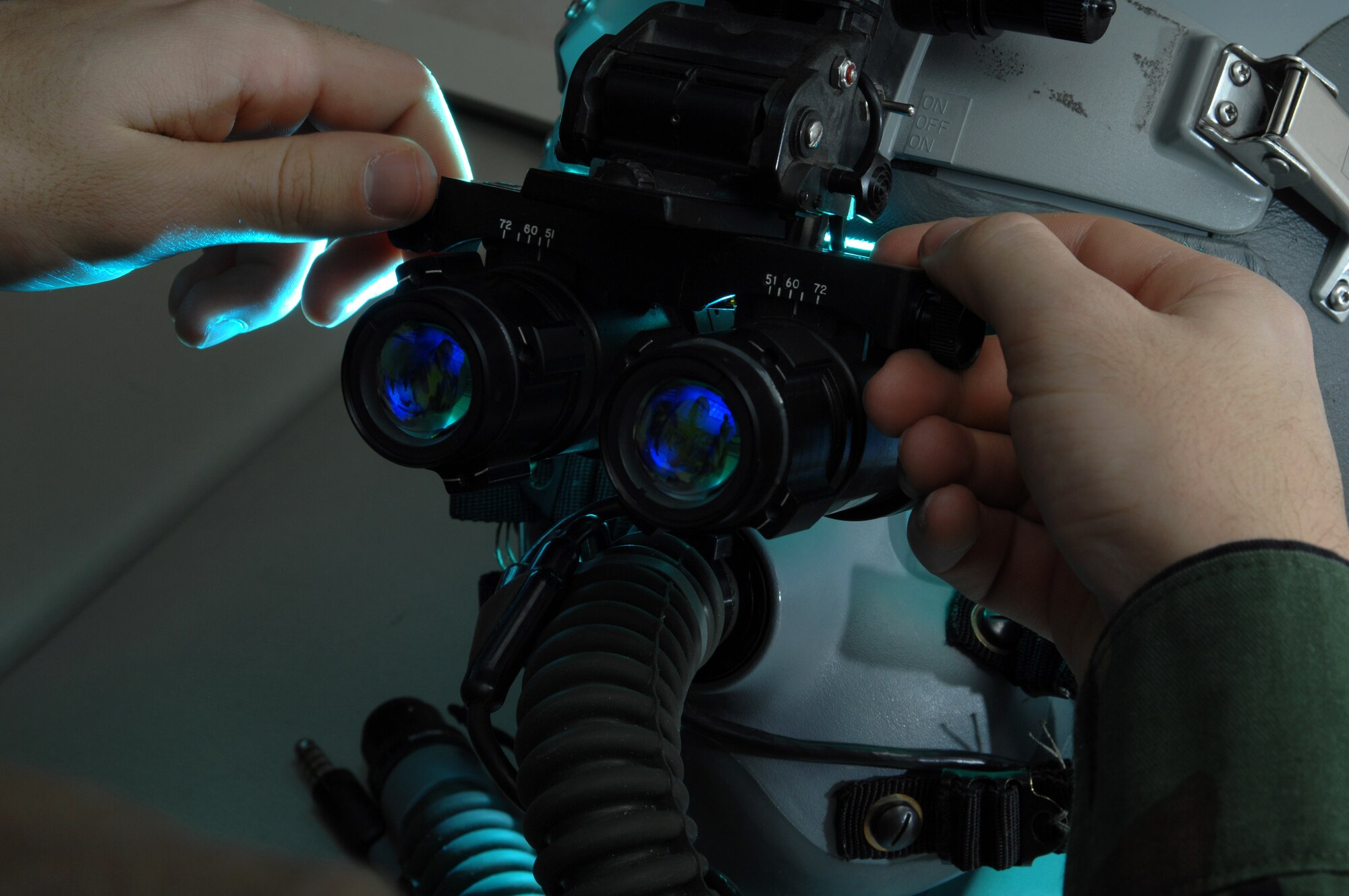 Airman 1st Class Andrew Witherspoon adjusts the eyespan on a pair of AS/AVS-9 Night Vision Goggles in the life support section of the 355th Fighter Squadron Nov. 29 at Eielson Air Force Base, Alaska. During the winter months, pilots at Eielson AFB are given a greater opportunity to train with NVG's more than their counterparts in the lower 48 states due to the decreased length of sunlight. (U.S. Air Force photo/Staff Sgt. Joshua Strang) 
