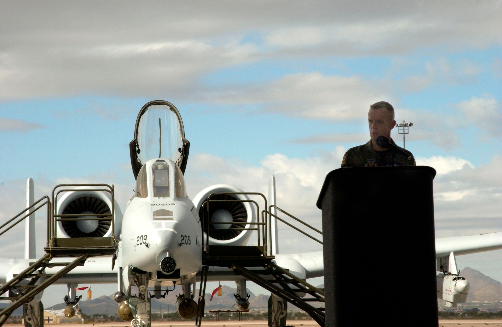 Col. Kent Laughbaum introduces the new A-10C Thunderbolt II during a 355th Wing roll-out ceremony at Davis-Monthan Air Force Base, Ariz. Nov. 29.  The A-10 has been modified with precision engagement technology to create the new and improved A-10C.  The enhancements include full integration of sensors, multi-functional color displays and a new hands-on-throttle-and-stick interface.  Colonel Laughbaum is the 355th Wing commander.  (U.S. Air Force photo/Airman 1st Class Alesia Goosic)