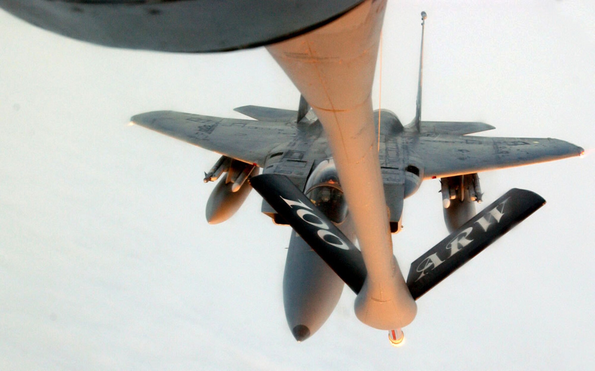 A KC-135 Stratotanker from the 100th Air Refueling Wing at Royal Air Force Mildenhall, England, prepares to offload fuel to an F-15 from the 48th Fighter Wing at RAF Lakenheath, England. The F-15 joined other U.S. Air Forces in Europe aircraft from Aviano Air Base, Italy, and Spangdahlem AB, Germany, to provide security for the NATO Riga Summit that took place Nov. 28-29 in Latvia where the heads of state and government from the 26 NATO member countries met. Also providing support from USAFE were the 32nd Air Operations Center, the 1st Combat Communications Squadron, and the 616th Air and Space Communications Squadron from Ramstein AB, Germany. (U.S. Air Force photo/Airman 1st Class Teresa Pumphrey)