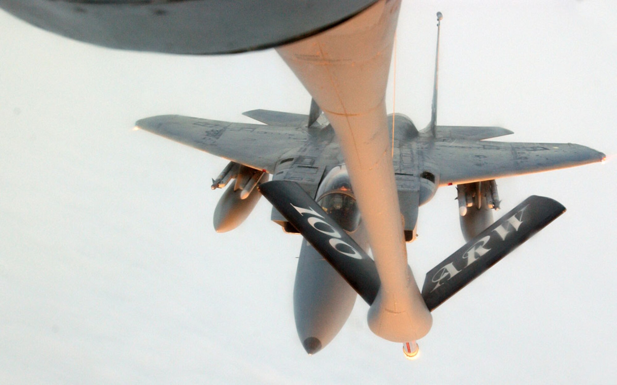 A KC-135 Stratotanker from the 100th Air Refueling Wing at Royal Air Force  Mildenhall, England, offloads more than 60,000 pounds in fuel to an F-15 from the 48th Fighter Wing at RAF Lakenheath, England. The F-15 joined other U.S. Air Forces in Europe aircraft from Aviano Air Base, Italy, and Spangdahlem Air Base, Germany, to provide security for the NATO Riga Summit that took place Nov. 28-29 in Latvia, where the heads of state and government from the 26 NATO member countries met. Also providing support from USAFE were the 32nd Air  Operations Center, the 1st Combat Communications Squadron, and the 616th Air and Space Communications Squadron from Ramstein Air Base, Germany. (U.S. Air Force photo/Airman 1st Class Teresa Pumphrey)

