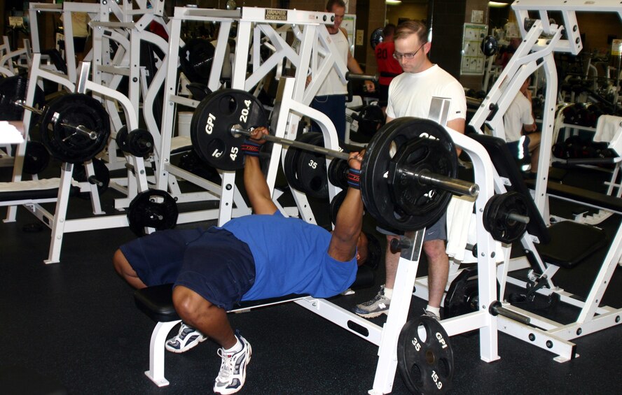 Darrin Charles, an instructor with the 366th Training Squadron, works out at the Levitow Fitness Center Tuesday. Charles set the record in the American Powerlifting Federation’s Military Squat record with a squat of 705 pounds in the 275 pound weight class. (U.S. Air Force photo/Airman Jacob Corbin).