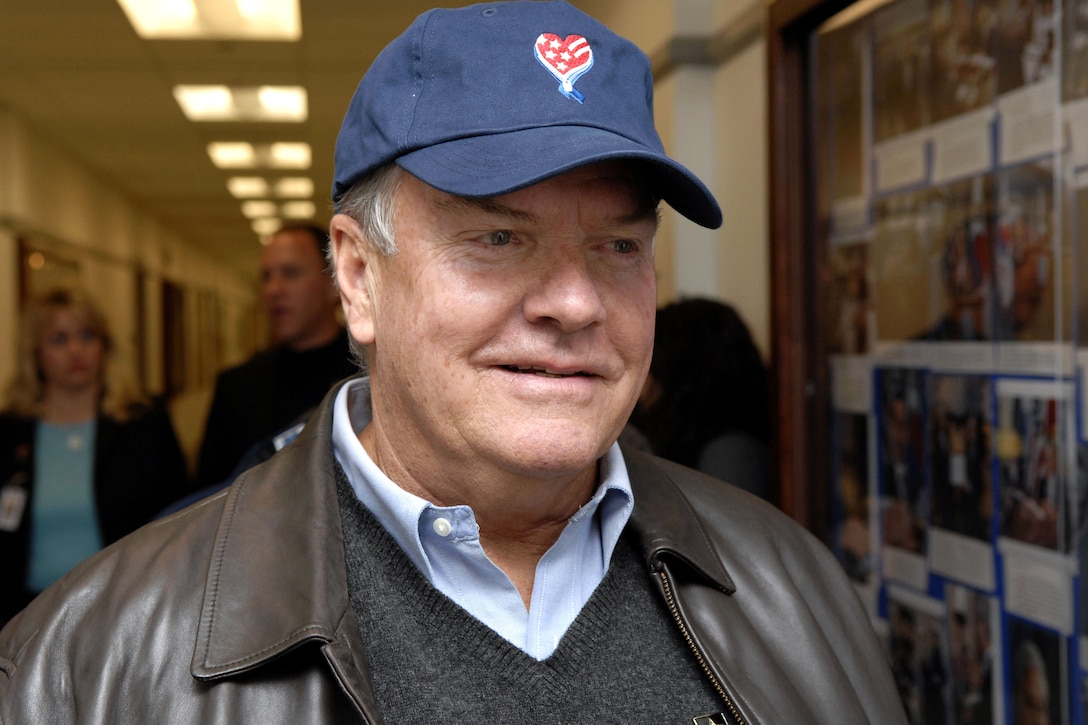 Peter Jason, an actor in Hallmark's movie "The Christmas Card," tours the Pentagon sporting an America Supports You cap Nov. 29. Cast members were in town visiting wounded servicemembers and promoting both the movie and Hallmark's "Cards for the Troops" program. Hallmark became an America Supports You team member Nov. 28. Photo by William D. Moss


