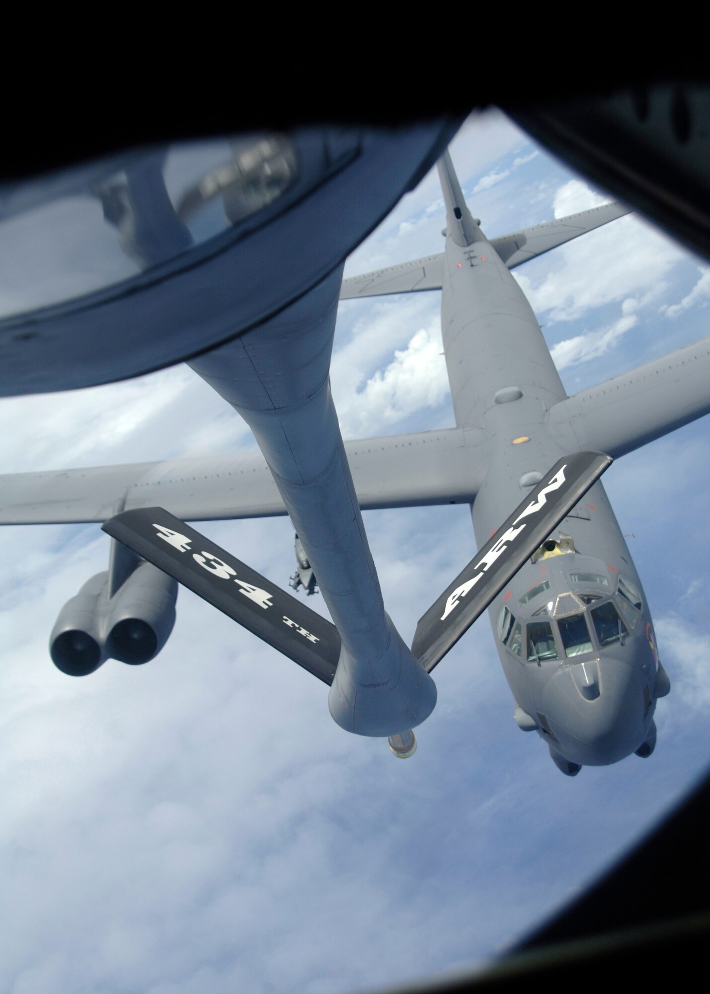 A B-52 from the 23rd Expeditionary Bomb Squadron stabilizes in pre-contact position during a recent air refueling mission near Andersen Air Force Base, Guam.  More than 90,000 pounds of fuel can be delivered via air refueling – a critical component in maintaining the ‘Global Reach’ of the heavy bomber force deployed to the Pacific region. (U.S. Air Force photo by Staff Sgt. Patrick Mitchell)