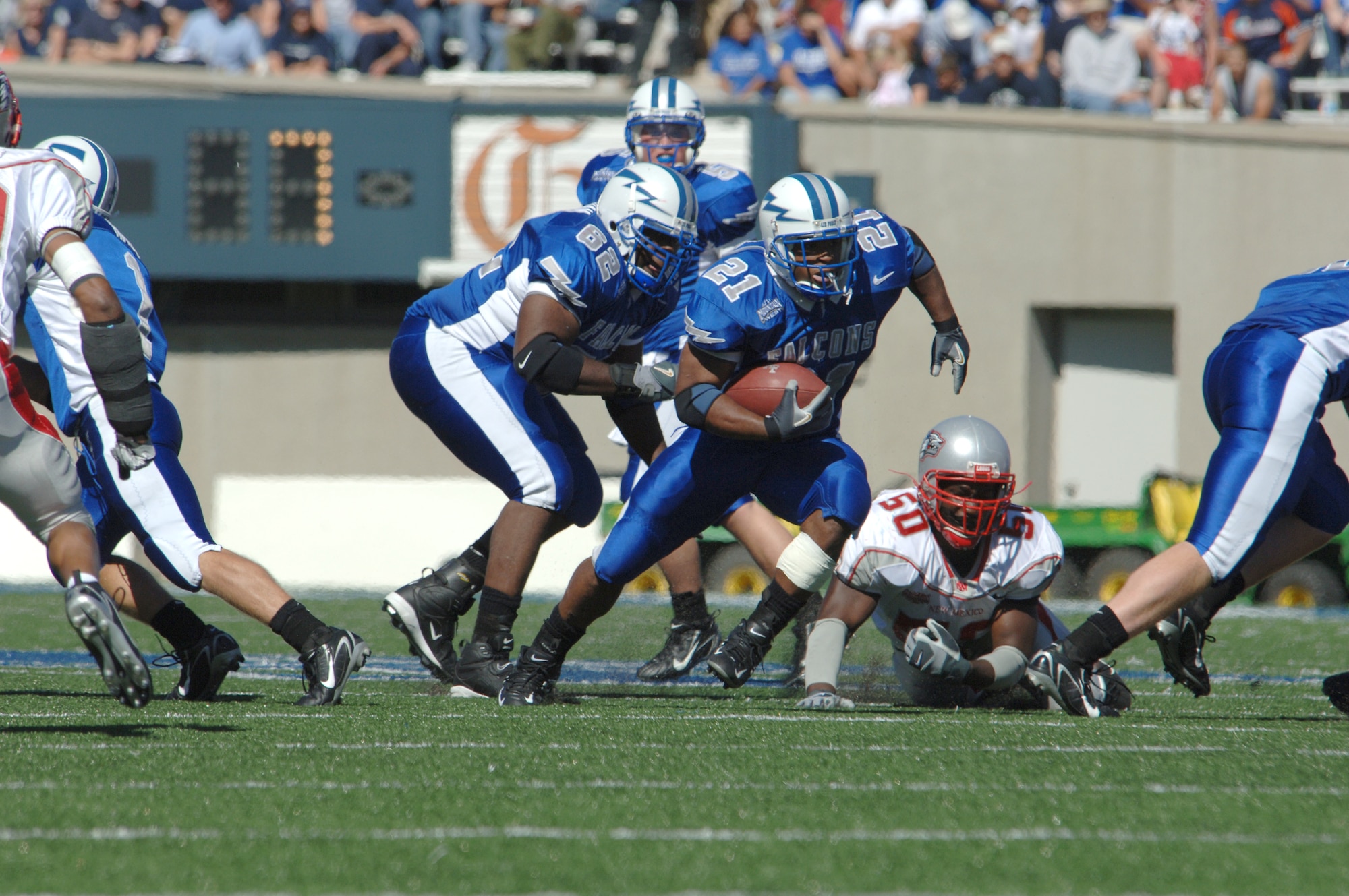 Air Force fullback Ryan Williams busts into the clear on a run up the middle Sept. 30. The junior fullback anchored the Falcons rushing attack by gaining 94 yards on 22 carries. The Falcons went on to grind out 262 yards rushing in their 24-7 victory over New Mexico. Air Force moves to 2-0 in the Mountain West Conference and 2-1 overall. (U.S. Air Force photo/John Van Winkle)