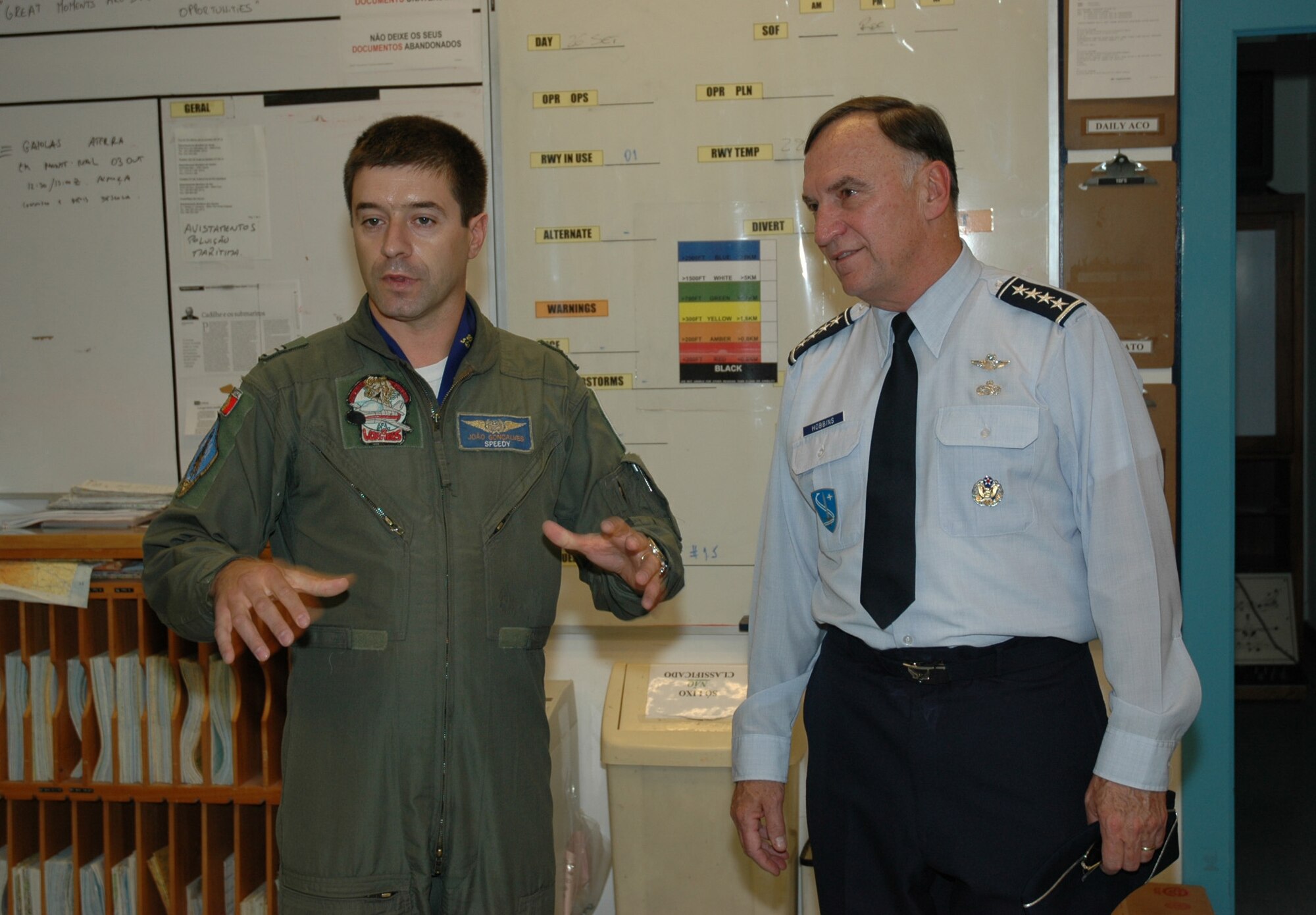MONTE REAL AIR BASE, Portugal--Gen. Tom Hobbins (right), U.S. Air Forces in Europe commander, receives an orientation visit to the 201st Falcon Squadron at Monte Real Air Base, Portugal, from Portuguese Major Joao ?Speedy? Goncalves Sep. 29. (U.S. Air Force Photo/Capt. Elizabeth Culbertson)

