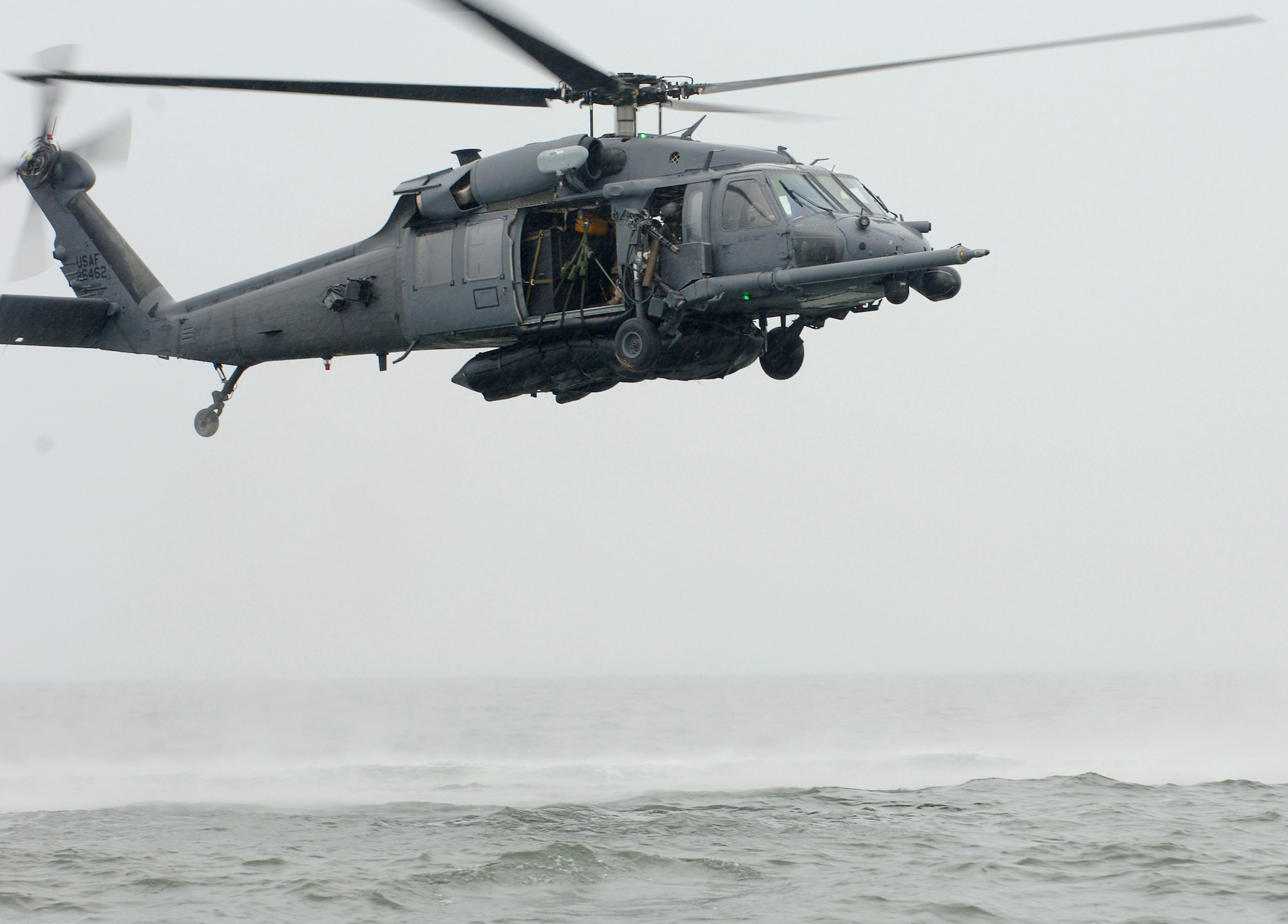 A rescue crew from the 347th Rescue Group at Moody Air Force Base, Ga., test a "Kangaroo Duck" in the Gulf of Mexico off the coast of Apalachicola, Fla. The K-Duck is an inflatable raft that is strapped to the underbelly of a rescue helicopter so it can be easily dropped to better assist with water-rescue scenarios like those experienced during Hurricane Katrina.  (U.S. Air Force photo/Airman 1st Class Schelli Jones)

