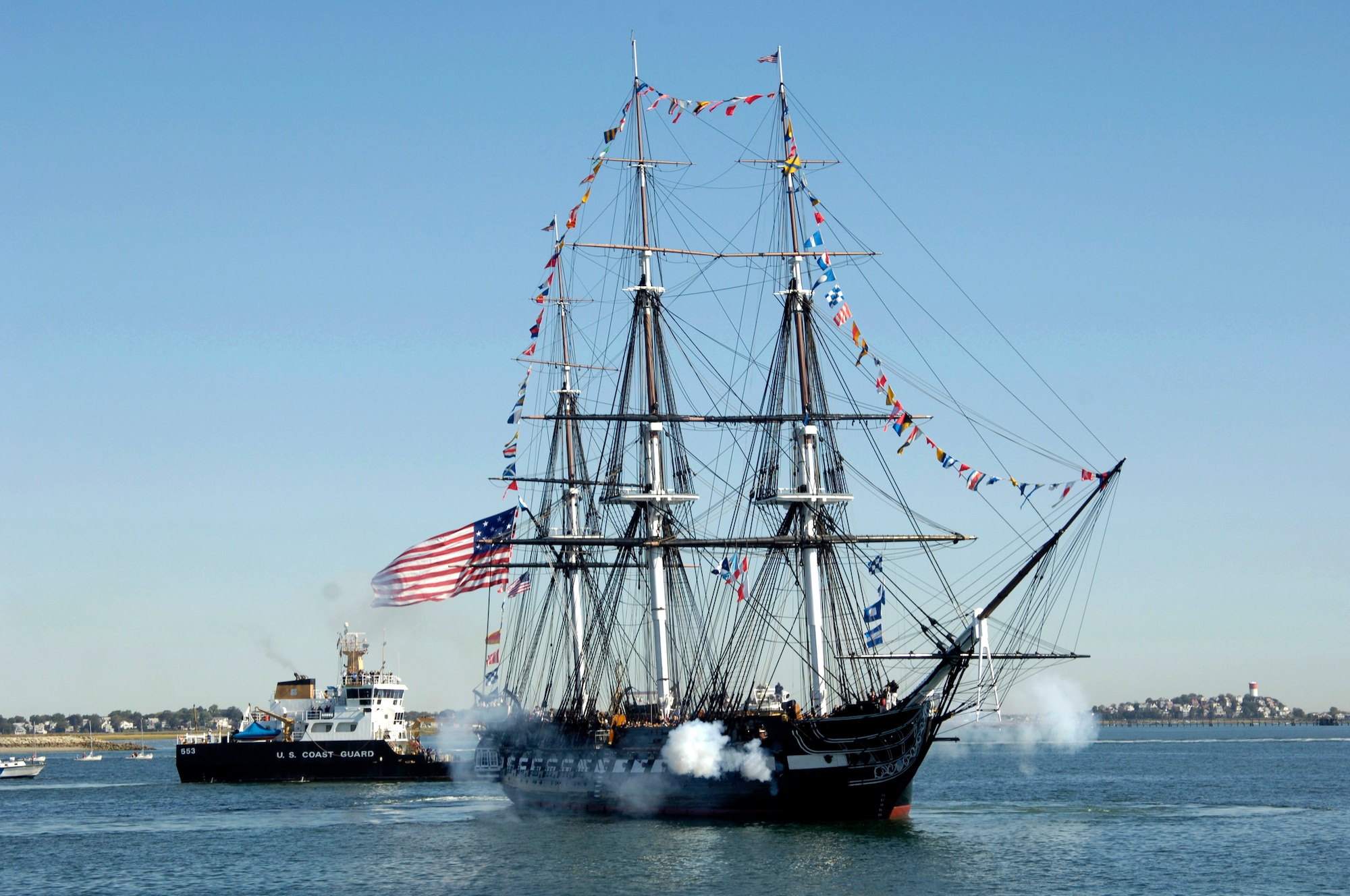 Crewmen aboard the USS Constitution fire a 21-gun salute to honor Medal of Honor recipients onboard the USS Constitution, the oldest commissioned warship afloat.  The Medal of Honor recipients were there for a turn-around cruise and Medal of Honor flag presentation Sept. 30 in Boston Harbor.  The Medal of Honor is the country's highest military honor, awarded for acts of valor above and beyond the call of duty.  (U.S. Air Force photo/Janice Abate)