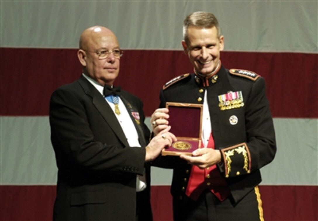 Chairman of the Joint Chiefs of Staff U.S. Marine Corps Gen. Peter Pace receives the Patriot Award at the 2006 Congressional Medal of Honor Society Convention Committee in Boston, Mass., Sept. 30, 2006. 