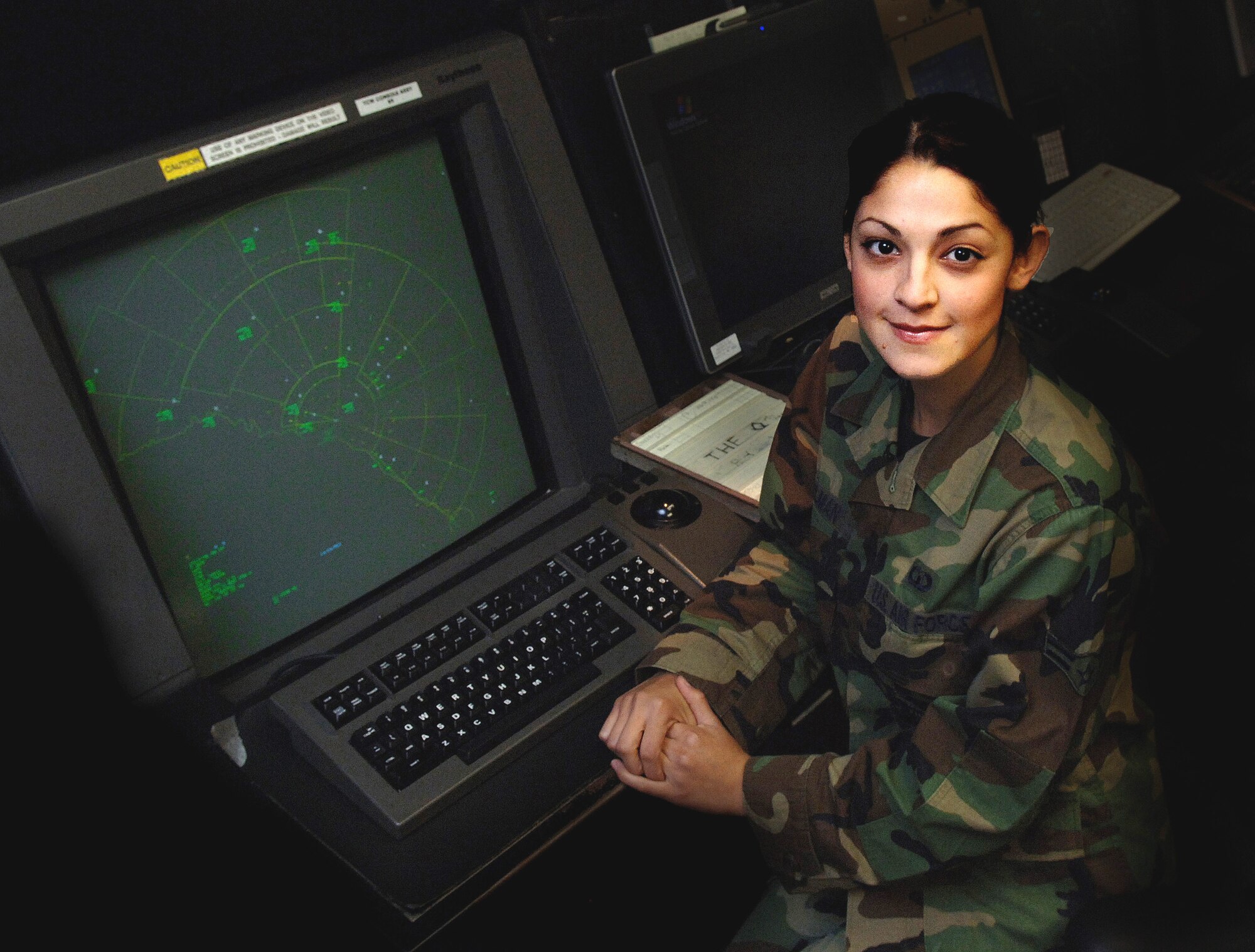 Airman 1st Class Stormi Samantha Gilman sits in front of her radar console at Laughlin Air Force Base, Texas. Airman Gilman is an air traffic controller with the 47th Operations Support Squadron. (U.S. Air Force photo/Tech. Sgt. Larry A. Simmons)