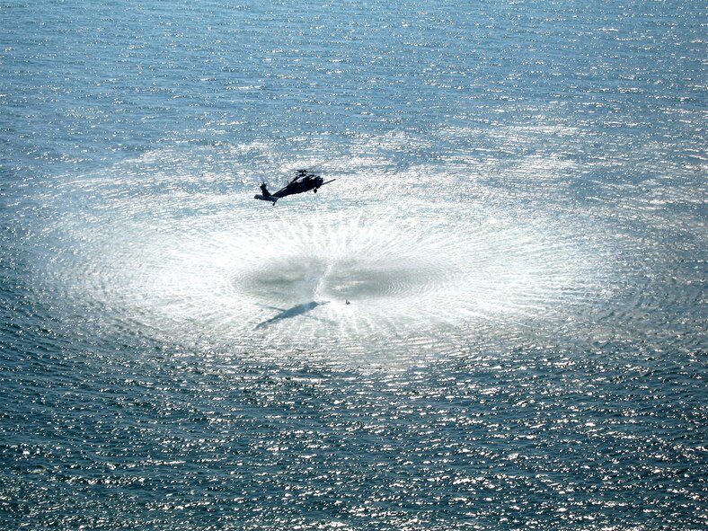 Air Force Reservists from the 920th Rescue Wing recover a boater who was missing for more than 24 hours in the Atlantic Ocean just off the coast of Jacksonville, Fla., Oct. 1, 2006. (U.S. Air Force photo/Master Sgt. Randolph Wells) 