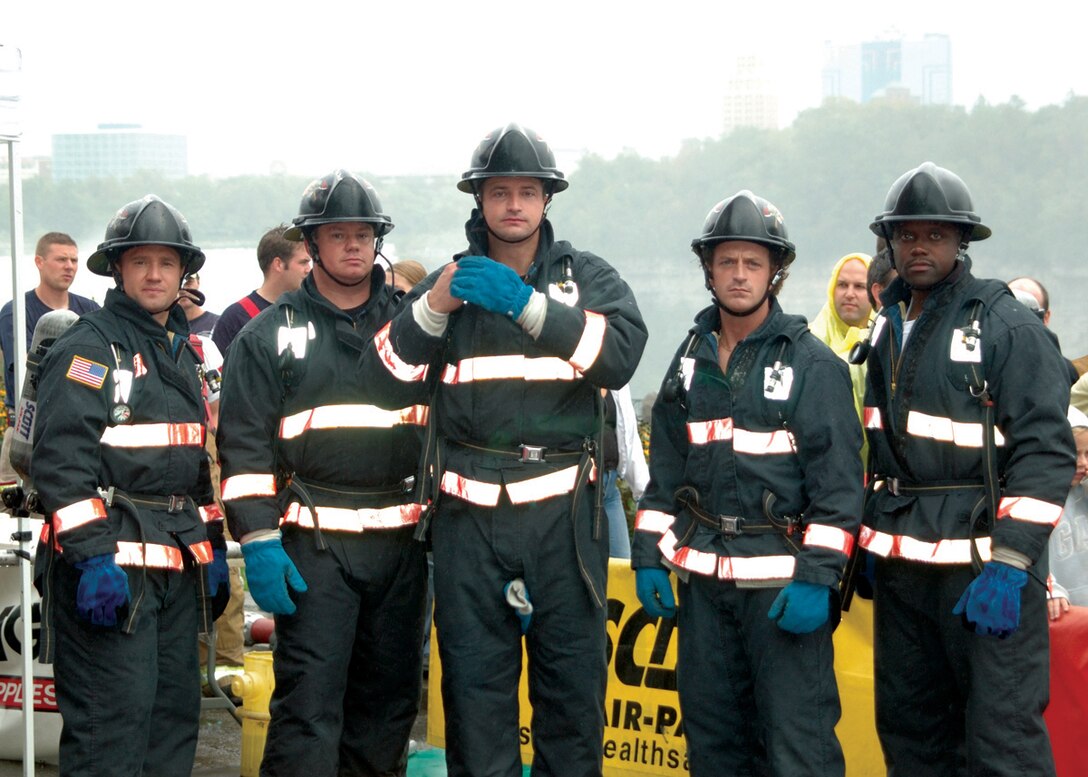 NIAGARA FALLS, ONTARIO, CANADA-Members from the Niagara Falls Air Reserve Station Fire Department compete in this annual event held this year in CANADA.  Members on the team are: (Left to Right) Firefighter Chad Larson, Lt. John McDonald, Lt. Mike Cameron,  Lt. Joe Foucha, and Lt. Ricardo Bush.  The four day event brought firefighters from all over Canada including the only American team from the Air Base.  The competition centered around five events; the Tower Climb, Hose Hoist, Forcible Entry, Hose Advance and Victim Rescue all of which replicate actual firefighting scenarios.  Niagara came in 7th place overall from over 500 compeating firefighters.  Photo by Master Sgt. Peter Borys, 914th Airlift Wing Public Affairs (Released)