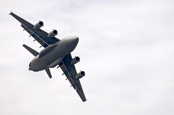 A C-17 Globemaster III practices aerial maneuvers Sept. 27 over Kona International Airport in Hawaii to prepare for an upcoming air show. The C-17 is from the 535th Airlift Squadron based at Hickam Air Force Base, Hawaii. (U.S. Air Force photo/Tech. Sgt. Shane A. Cuomo) 

