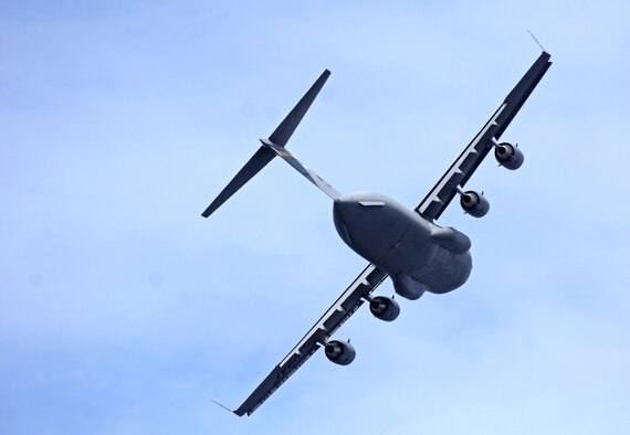 A C-17 Globemaster III practices aerial maneuvers Sept. 27 over Kona International Airport in Hawaii to prepare for an upcoming air show. The C-17 is from the 535th Airlift Squadron based at Hickam Air Force Base, Hawaii. (U.S. Air Force photo/Tech. Sgt. Shane A. Cuomo) 
