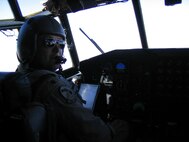 Lt. Col. Kevin White commands a C-130 aircraft as the crew travels through Afghanistan during Operation Mountain Fury. (Courtesy photo)
