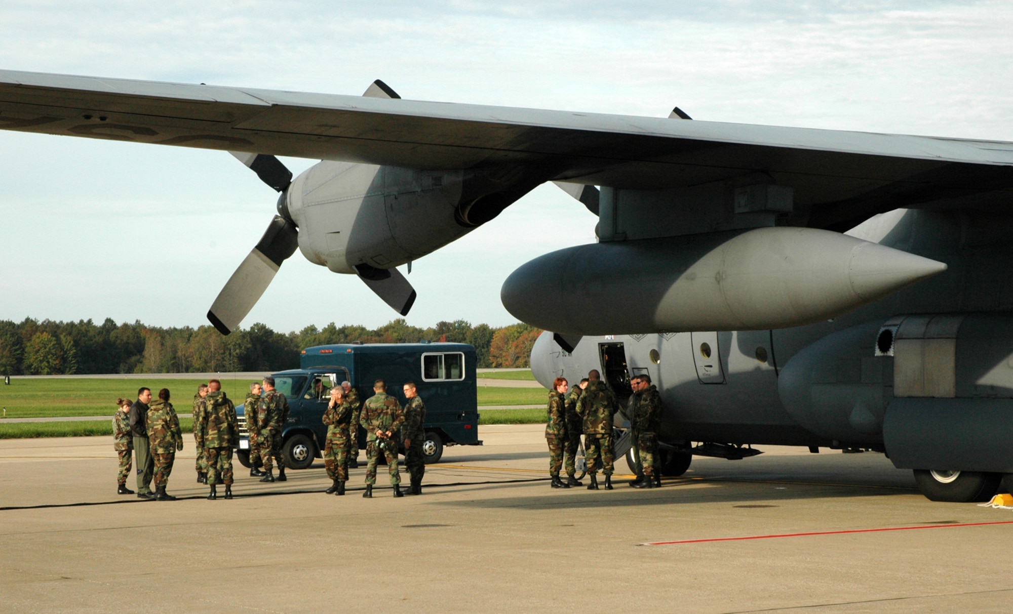 YOUNGSTOWN AIR RESERVE STATION, Ohio -- About 75 Air Force Reservists from the 910th Airlift Wing here deployed to Ramstein AB, Germany Oct. 2 on an Operation Joint Forge deployment.  This was the first of three groups of more than 200 aircrew members and aircraft maintenance technicians deploying to provide C-130 troop and cargo movement to U.S. forces serving in the European theater and African Union troops in the Darfur region of Sudan.  The rotations will continue through mid November 2006.  U.S. Air Force photo/Master Sgt. Bryan Ripple