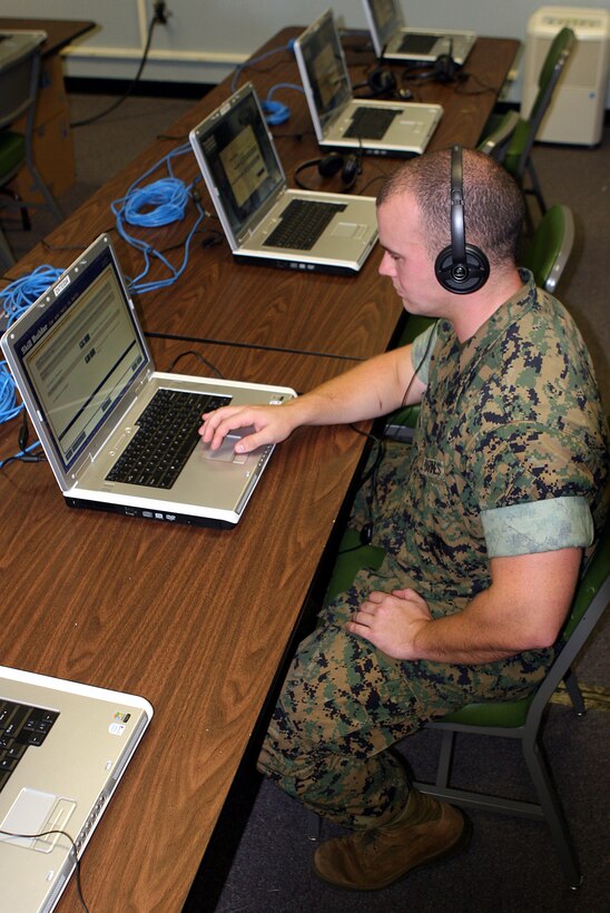 MARINE CORPS BASE CAMP LEJEUNE, N.C. ?   Cpl. Joshua W. Zeigler, a terminal operator and Tube-launched, Optically-tracked, Wire-guided missile system gunner with Exercise and Simulations Division, II Marine Expeditionary Force, demonstrates the use of Tactical Language and Culture Training System or Tactical Iraqi, Oct. 5.  As a language and cultural software training program, Tactical Iraqi capitalizes on video gaming technology by training a younger generation more who grew up with computer graphics rather than the foreign language books and flash cards of the past.