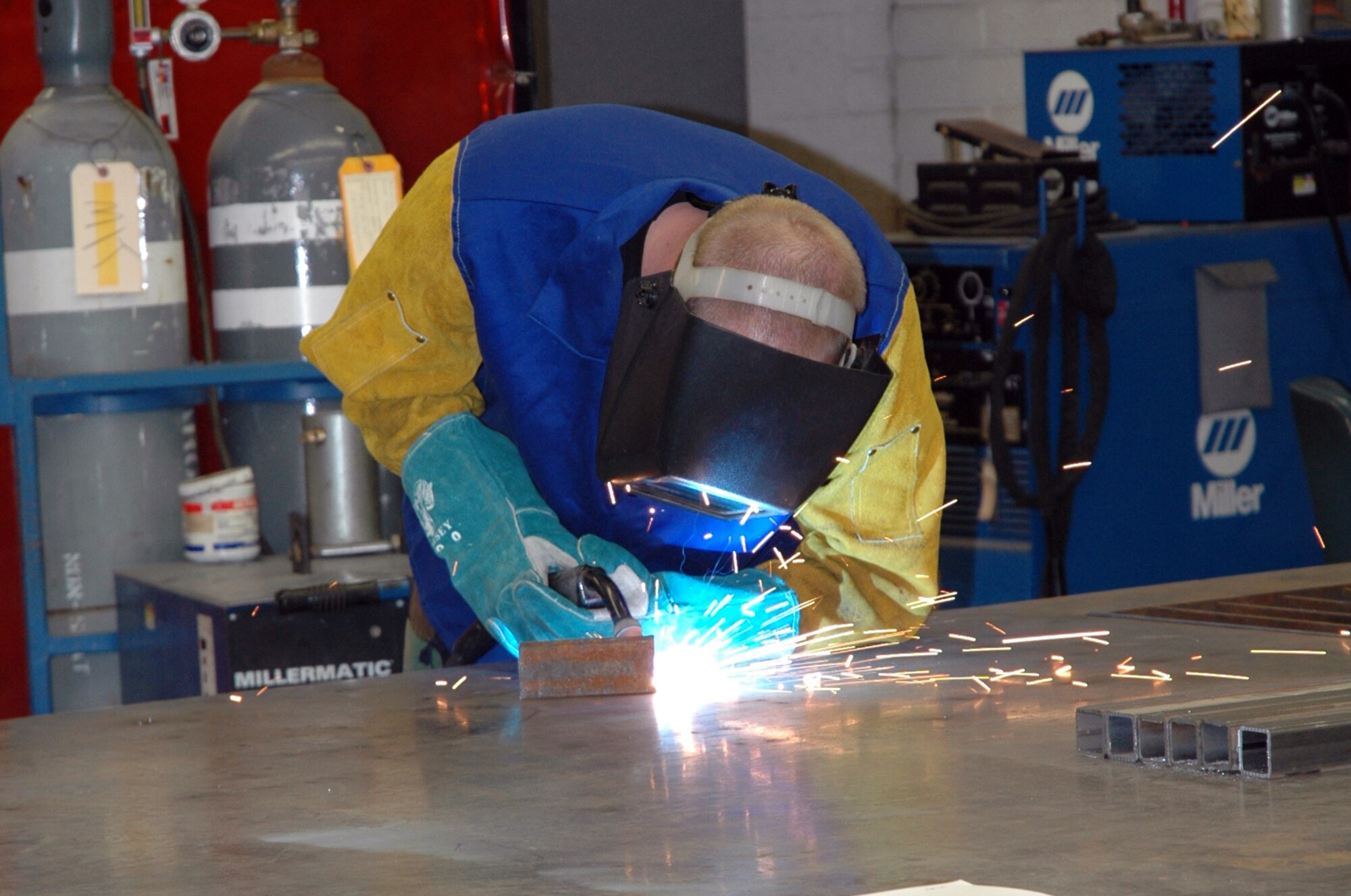 Senior Airman Phillip Whitaker, 944th Maintenance Squadron aircraft metals technician, practices his welding skills. Typical items welded at the structural maintenance shop including aerospace ground equipment, C-1 stands, tool bars and cracks in doors. (U.S. Air Force photo/Staff Sgt. Susan Stout)