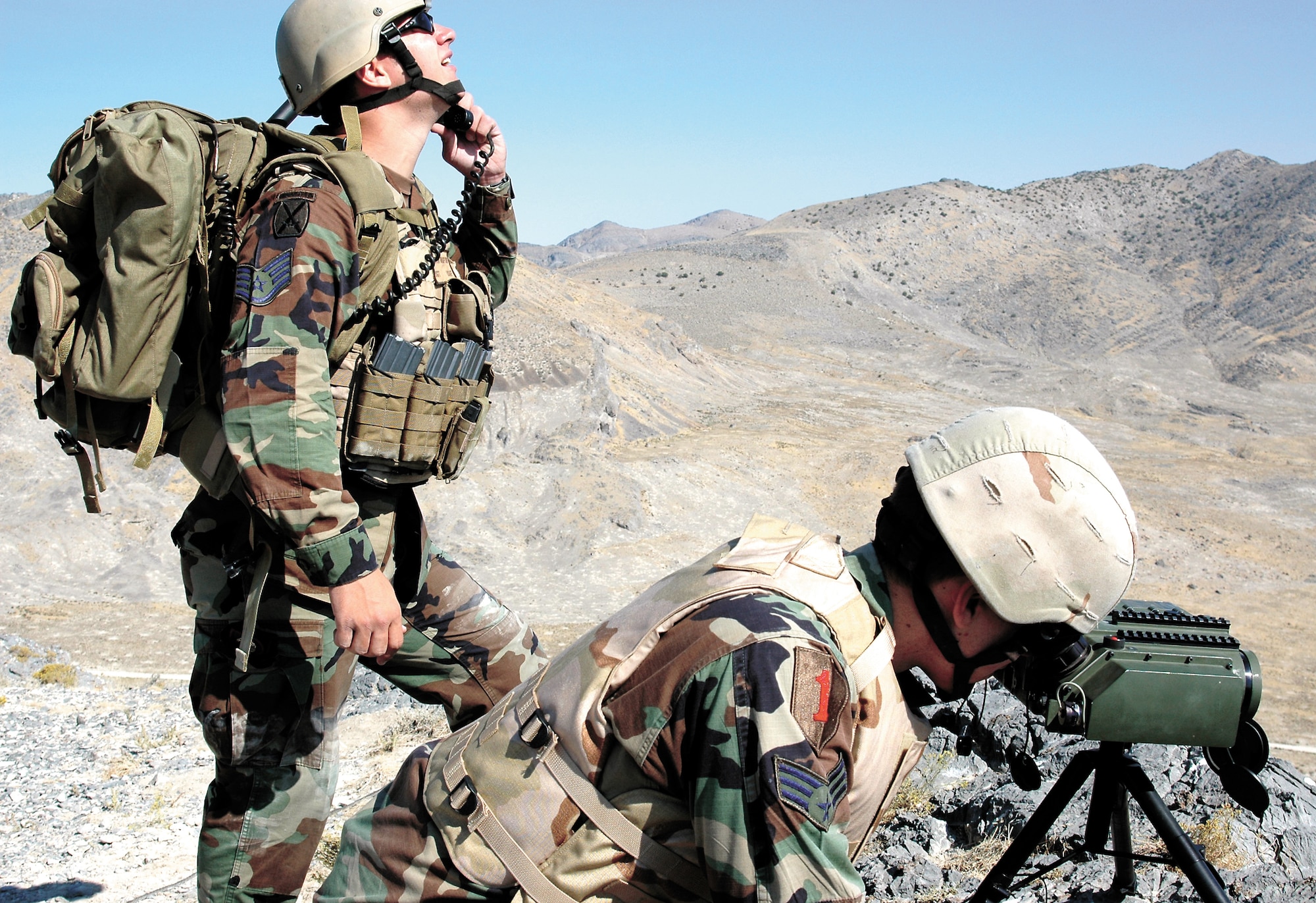Staff Sgt. Trevor Bradford and Senior Airman Joshua Woeckener, both with the Joint Tactical Air Control team from Washington, train at the Utah Test and Training Range. (U.S. Air Force photo by Airman 1st Class Stefanie Torres)
