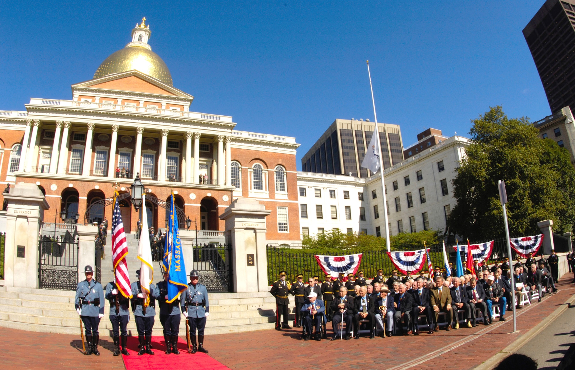 A Massachusetts State Police color guard presents the colors Sept. 27 during a special ceremony for more than 70 Medal of Honor recipients in Boston for an annual convention.  The ceremony, held in front of the State House, was attended by state leaders and active-duty servicemembers and ROTC cadets of all branches of military service. The Air Force Band of Liberty from Hanscom Air Force Base provided the music accompaniment for the ceremony. (U.S. Air Force photo/Jan Abate)