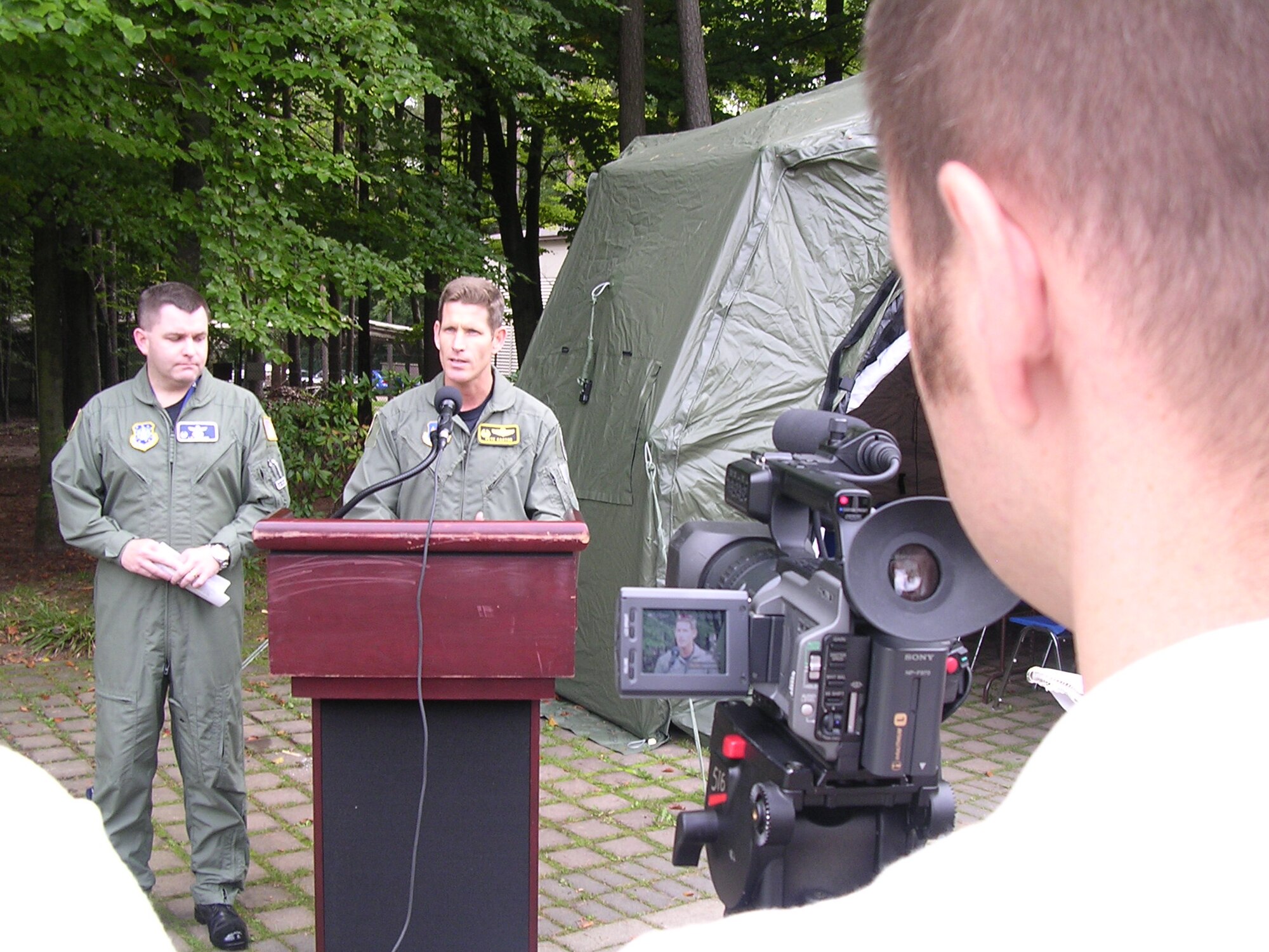 Col. Pete Castor, 32nd Air Operations Center, answers questions from the media during a mock press conference Sunday for Exercise Austere Challenge. (Photo by Capt. Phillip Ulmer, USAFENS)
