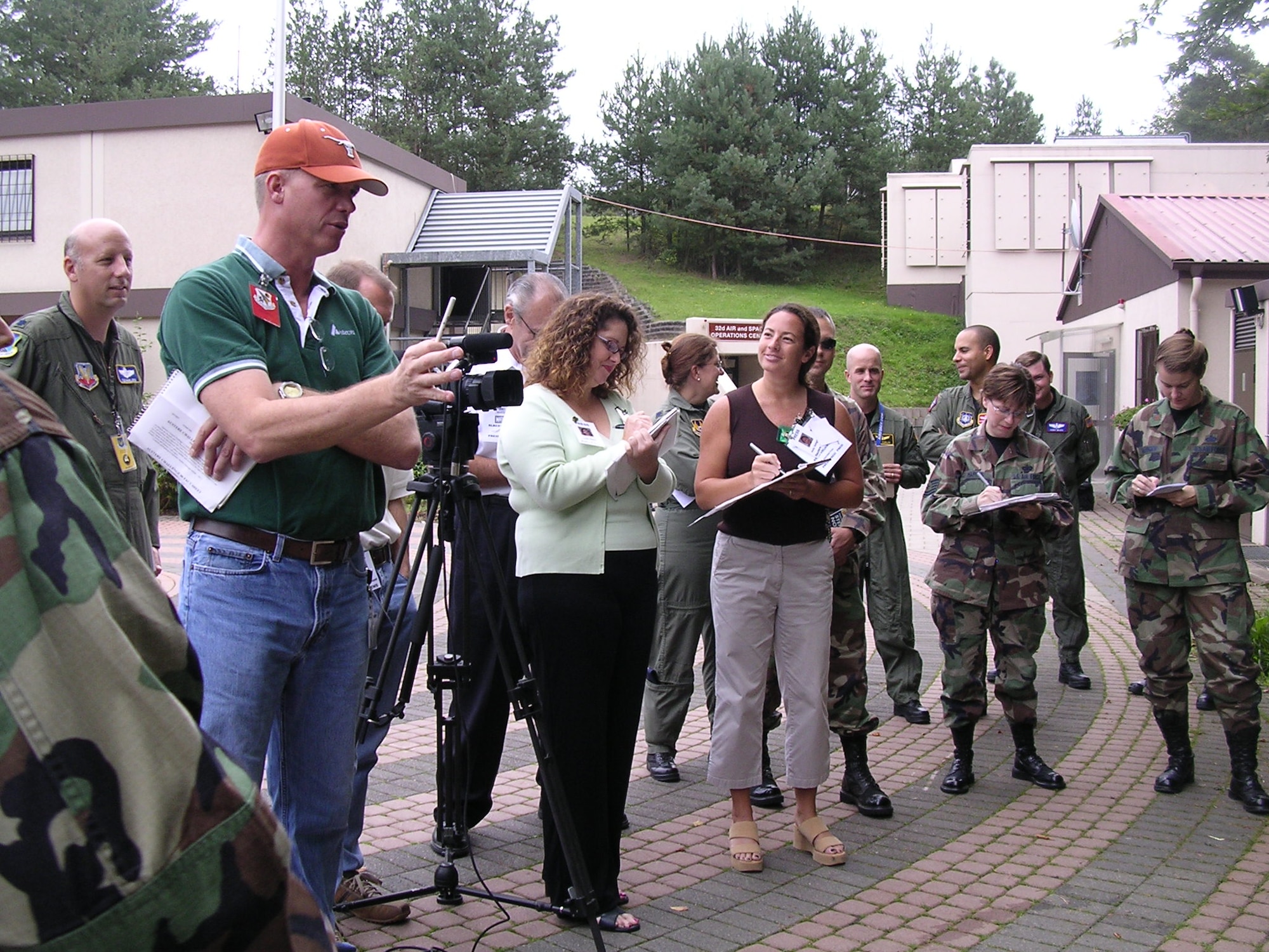 Members of the Joint Public Affairs Center and others play media during a mock press conference Sunday for Exercise Austere Challenge. (Photo by Capt. Jennifer Lovett, USAFENS)
