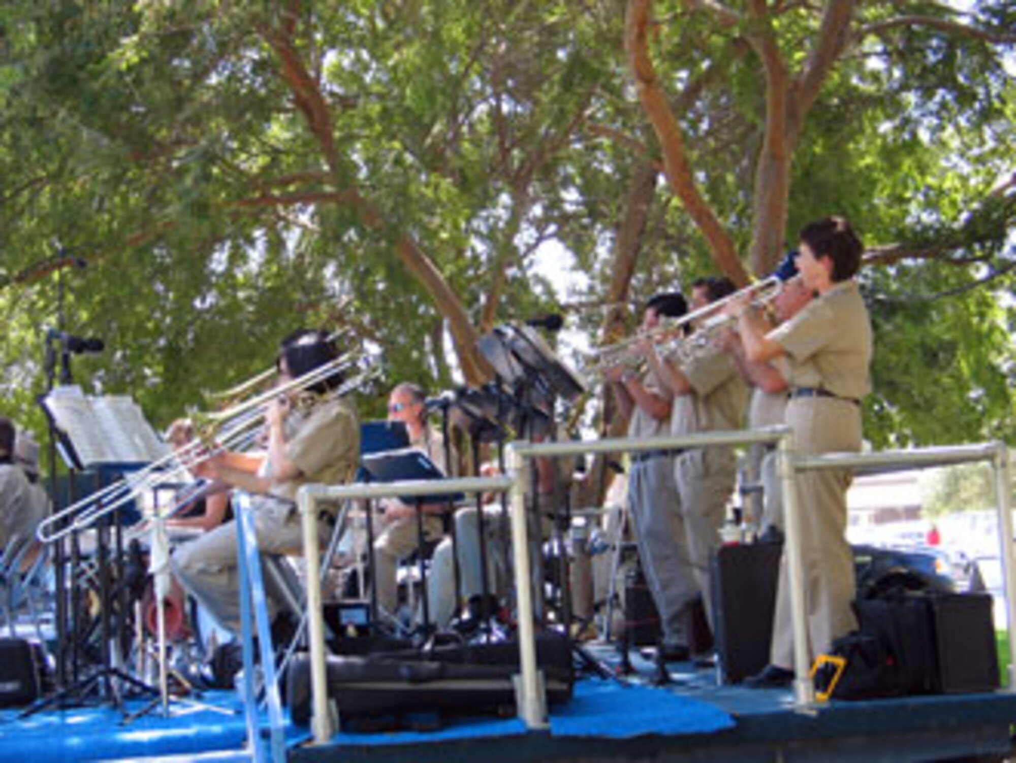 The Citrus Swing Orchestra performs during the annual base wide picnic held on Saturday, September 16. The local communities of Riverside and Moreno Valley organized and funded the picnic to show their appreciation to the military members who work at the base. More than 5,000 military members and their families attended the event. This is the 34th appreciate day picnic the community has hosted for March Air Reserve Base. (U.S. Air Force photo by MSgt Carson Hampton)