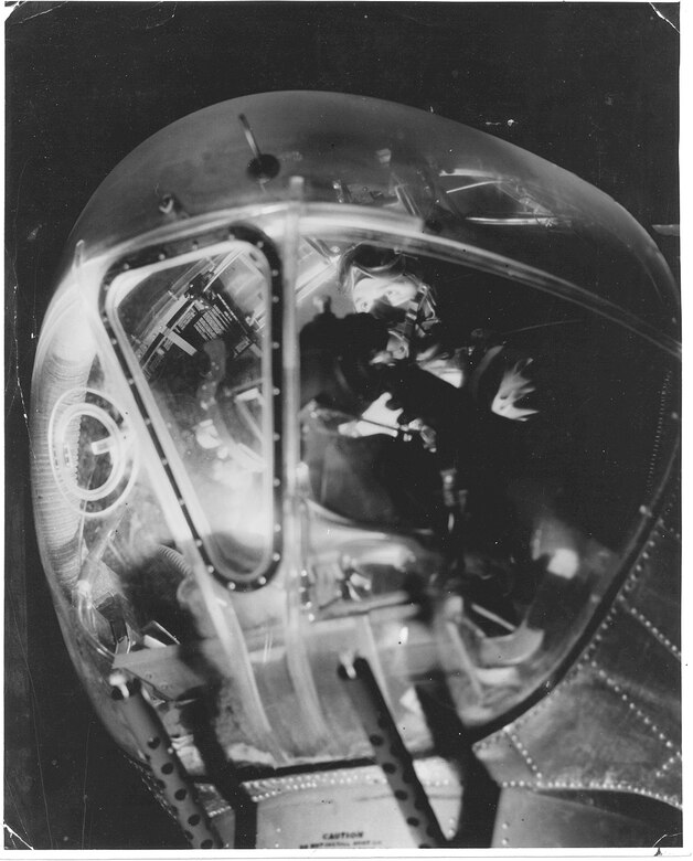 99th Bombardment Group bombardier in position in the nose of a B-17 Flying Fortress