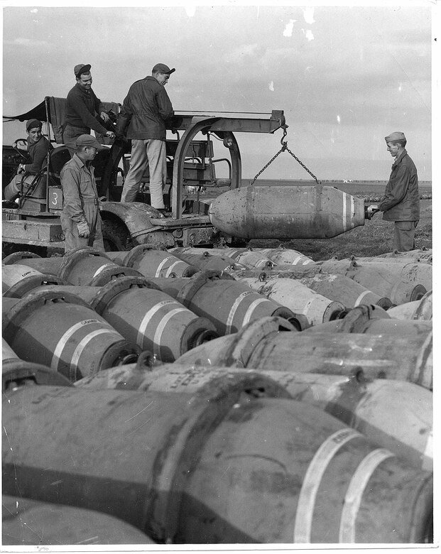 99th Bombardment Group Airmen prepare bombs for a mission
