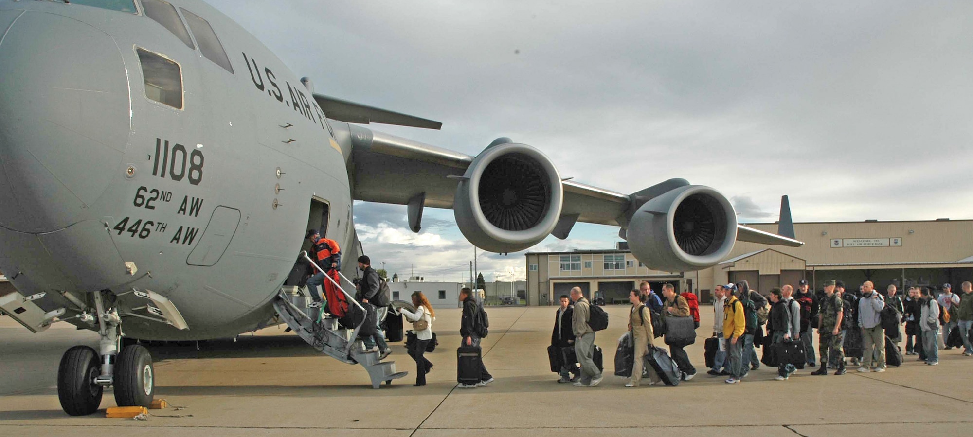 HILL AIR FORCE BASE, Utah - Reservists board a C-17 Globemaster III at Hill AFB. They are part of the 50  Reservists who fly to McChord AFB, Wash., monthly for unit training assemblies. (USAF photo by Staff Sgt. Nick Przybyciel)