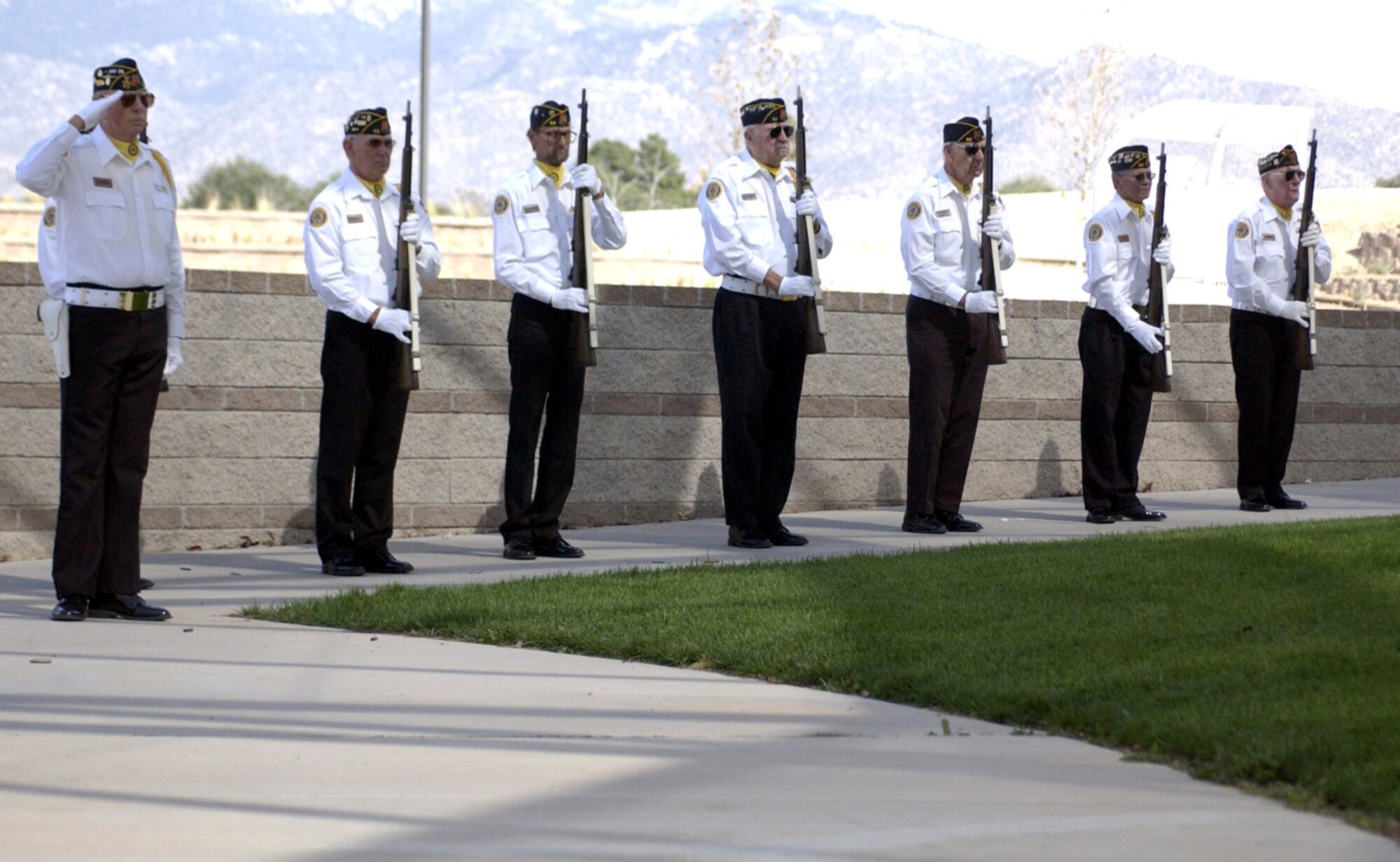Members of the Albuquerque American Legion present arms during the Berlin Airlift plaque dedication at Veterans Memorial Park in Albuquerque, N.M. Oct. 4. There were more than 150 attendees at the dedication. (U.S. Air Force Photo/Staff Sgt. Jeremy Larlee)