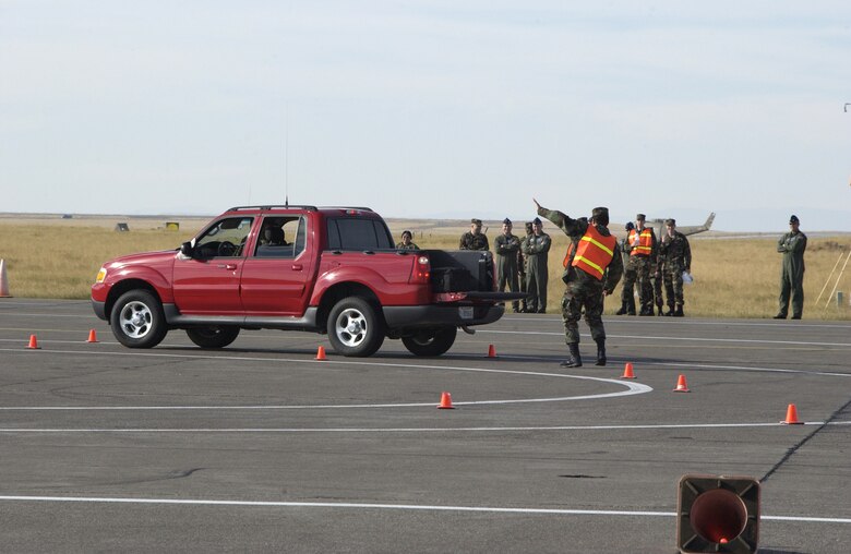 Members of the 10th Missile Squadron navigate the driving course during the Line Swine Competition Sept. 29.