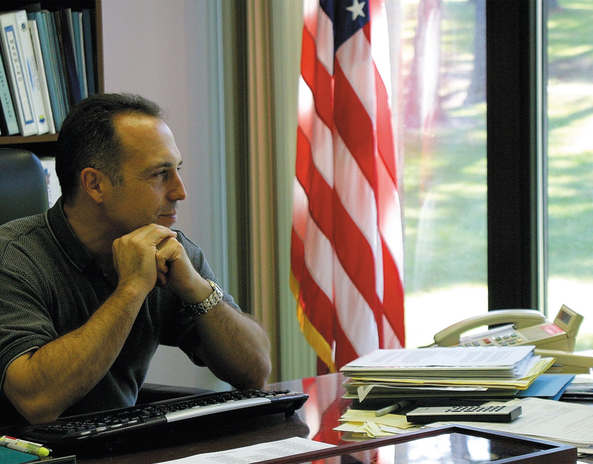 Maj. George Tombe IV, 43rd CPTS, looks over the records being submitted for the final closeout of the FY06 budget. (U.S. Air Force photo/1st Lt. Lisa Ferguson)