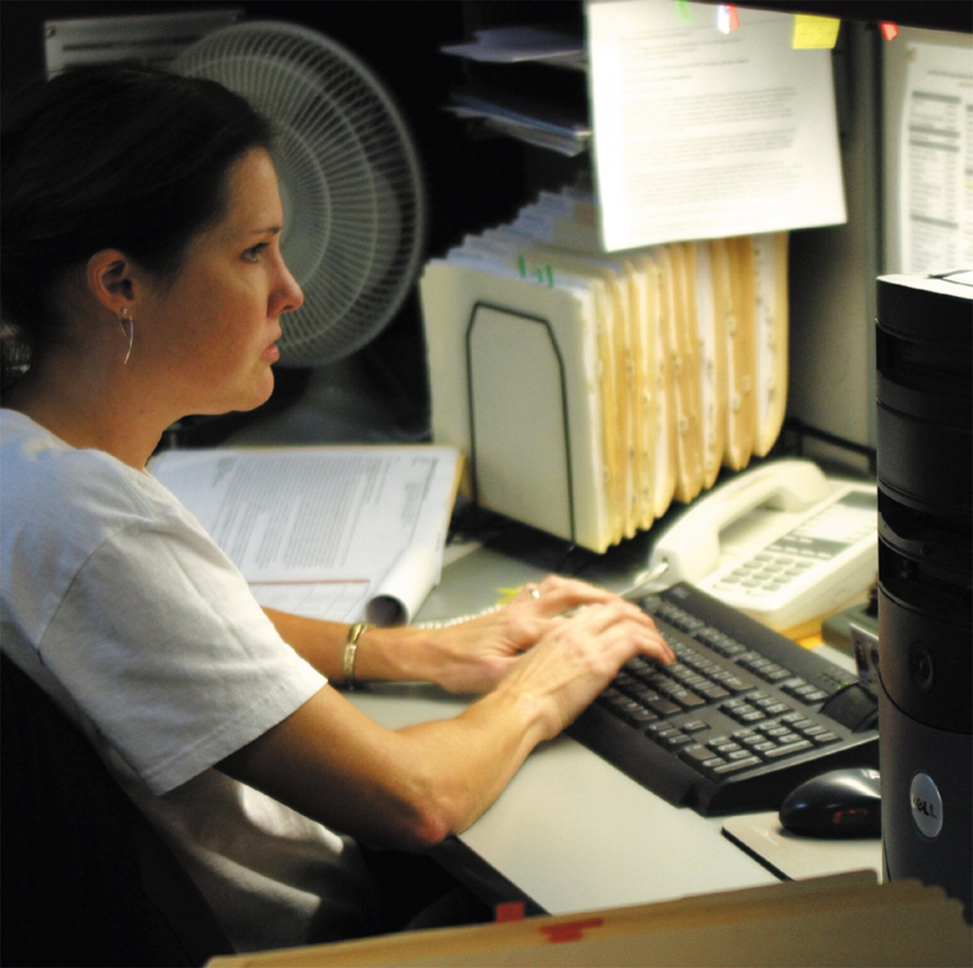Jaime Sachette, 43rd Contracting Squadron, works late into the night to complete the 43rd CONS budget. (U.S. Air Force photo/1st Lt. Lisa Ferguson)