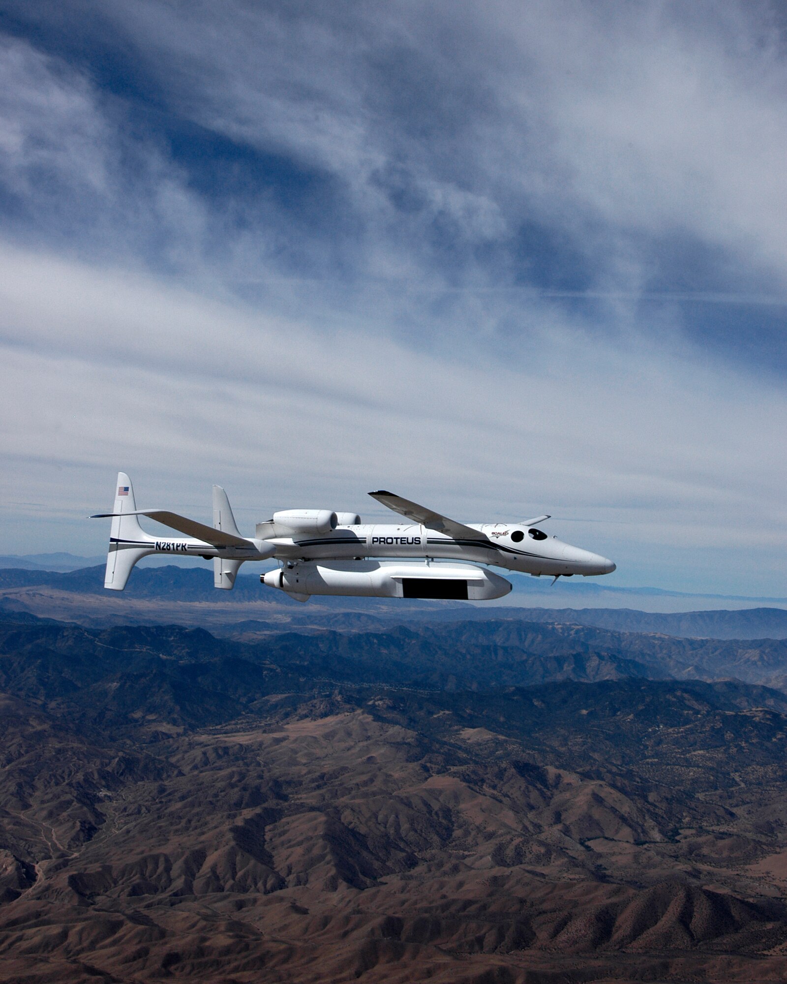 A Proteus aircraft flies over southern California Sept. 30 carrying the Global Hawk variant of the new, Multi-Platform Radar Technology Insertion Program radar.  This is the first flight test of the state-of-the-art radar system, which will be incorporated onto the Global Hawk and, in a larger configuration, onto a wide-body technology demonstrator.  The Proteus is a high-altitude aircraft similar in size to Global Hawk.  (Courtesy Northrop Grumman Corp.)