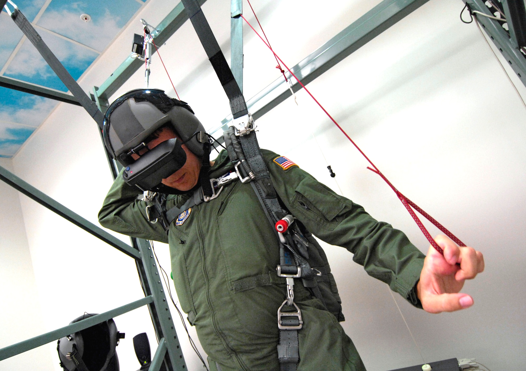 Tech. Sgt. Ken Bragg steers his parachute during virtual training at Hickam Air Force Base, Hawaii, on Oct. 4. Sergeant Bragg is the 15th Operations Support Squadron wing tactics NCO in charge. (U.S. Air Force photo/Tech. Sgt. Shane A. Cuomo)
