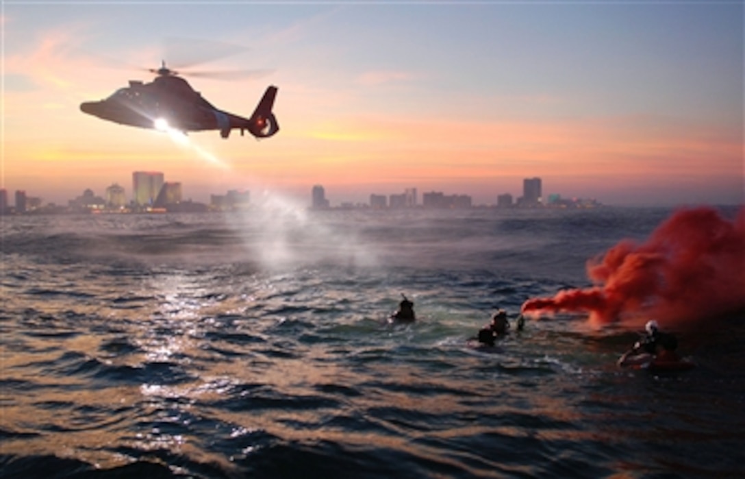 U.S. Coast Guard rescue swimmers from Coast Guard Air Station Atlantic City conduct rescue training off of the coast Atlantic City, NJ, Sept. 28, 2006.   