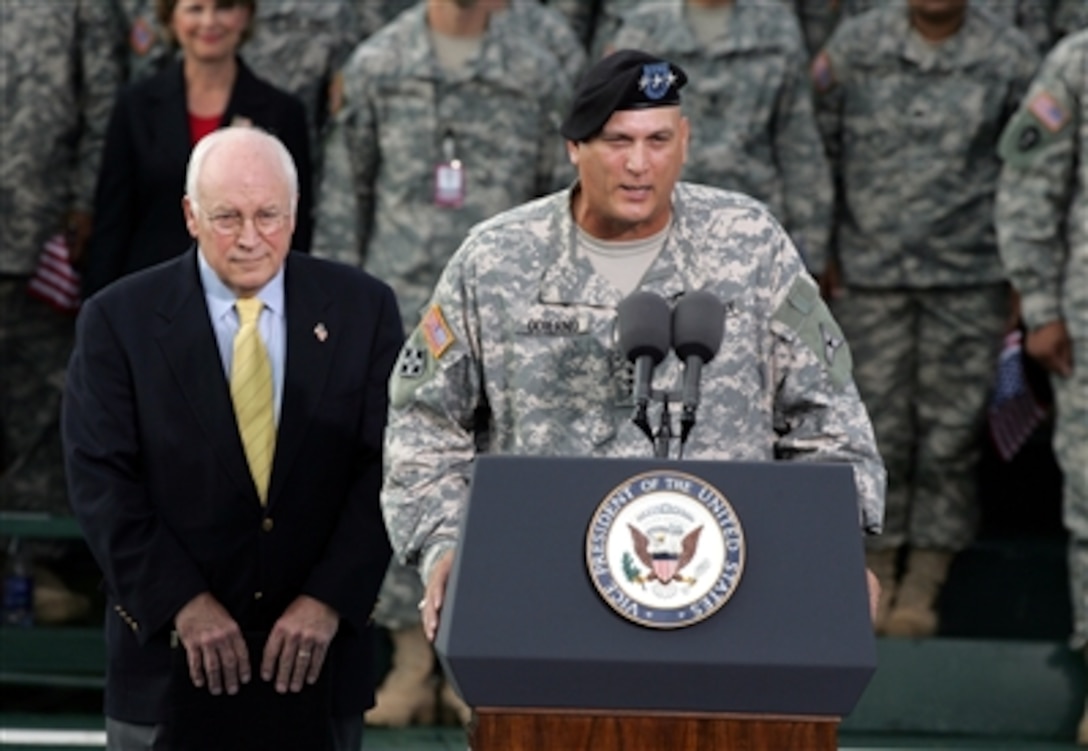 U.S. Army Lt. Gen. Raymond T. Odierno, commander of III Corps and Fort Hood, introduces Vice President Richard B. Cheney, left, at Cooper Field on Fort Hood, Texas, Oct. 4, 2006. Cheney addressed more than 8,500 soldiers. 