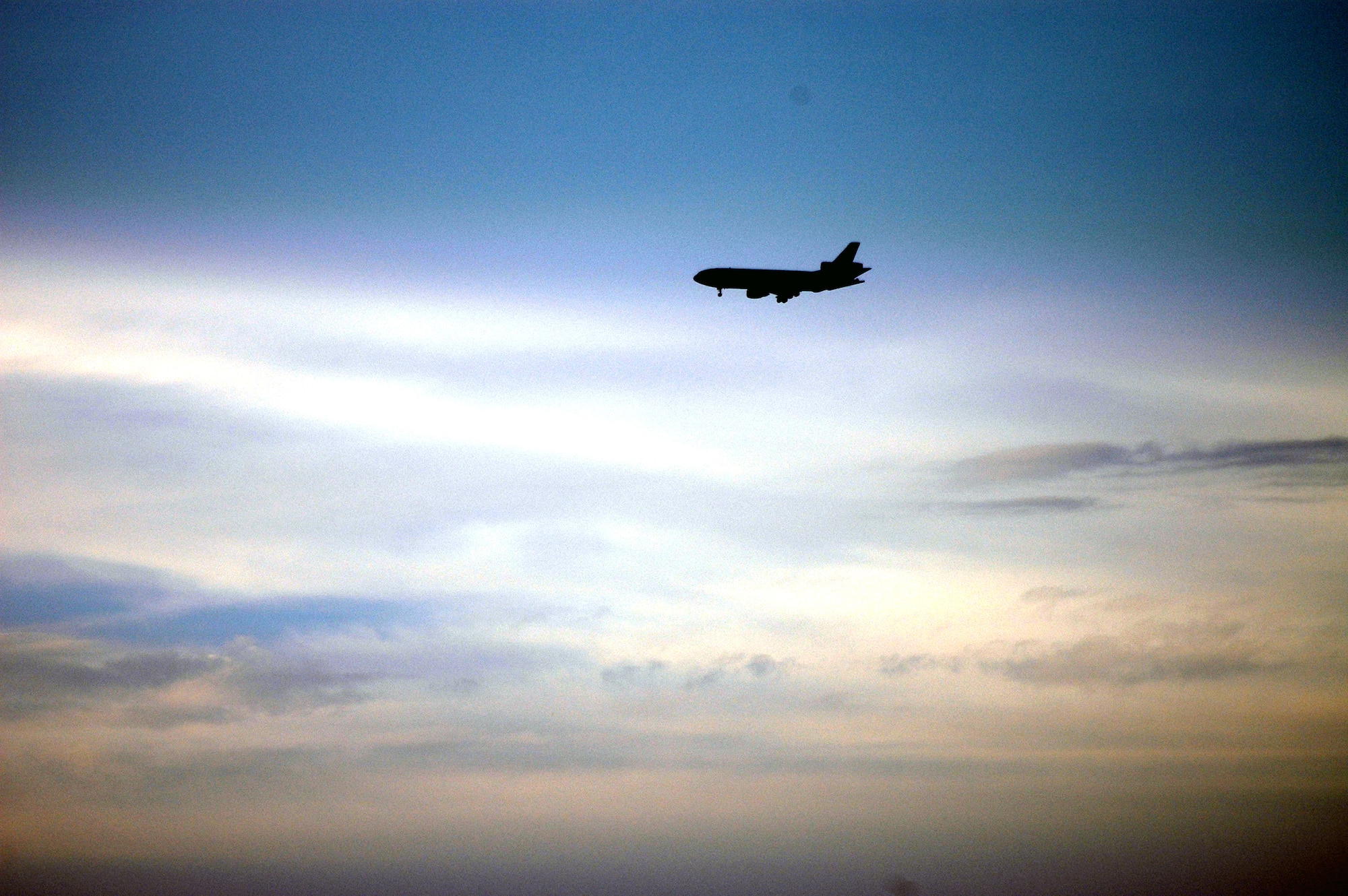 A KC-10 Extender refueling aircraft from the 305th Air Mobility Wing at McGuire Air Force Base, N.J., flies over the base on its way back from a mission Oct. 3.  The KC-10 is one of the Air Force's main refuelers.  (U.S. Air Force photo/Tech. Sgt. Scott T. Sturkol)