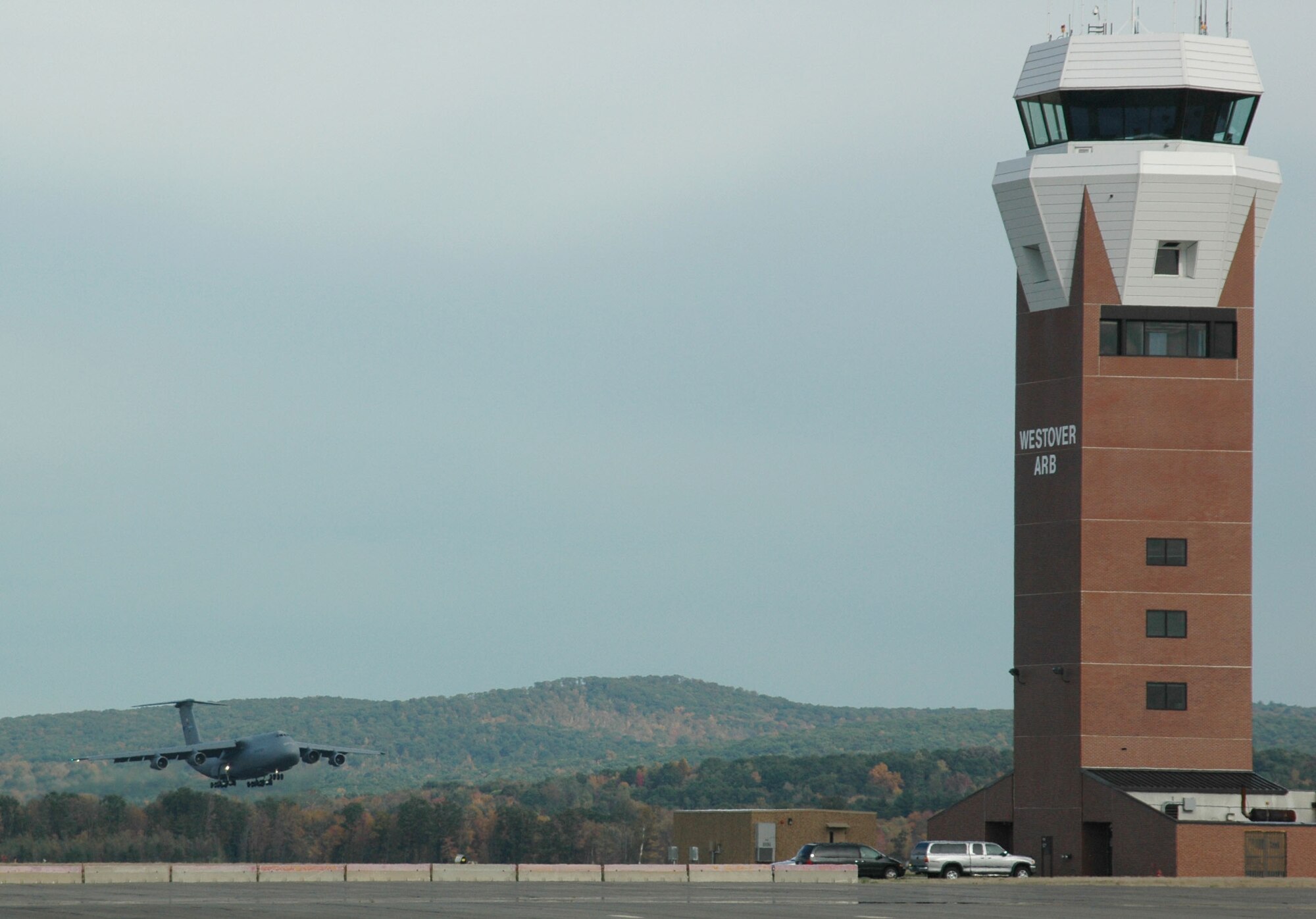 A 439th Airlift Wing C-5 Galaxy approaches the runway at Westover Air Reserve Base amid the crisp fall colors of New England. Sixteen C-5 transports are assigned to the Air Force Reserve's Patriot Wing at Westover, one of several all-Reserve C-5 units in the United States. More than 2,500 reservists travel from 32 different states to train at Westover, the nation's largest Air Force Reserve base. (US Air Force photo/Tech. Sgt. Andrew Biscoe)