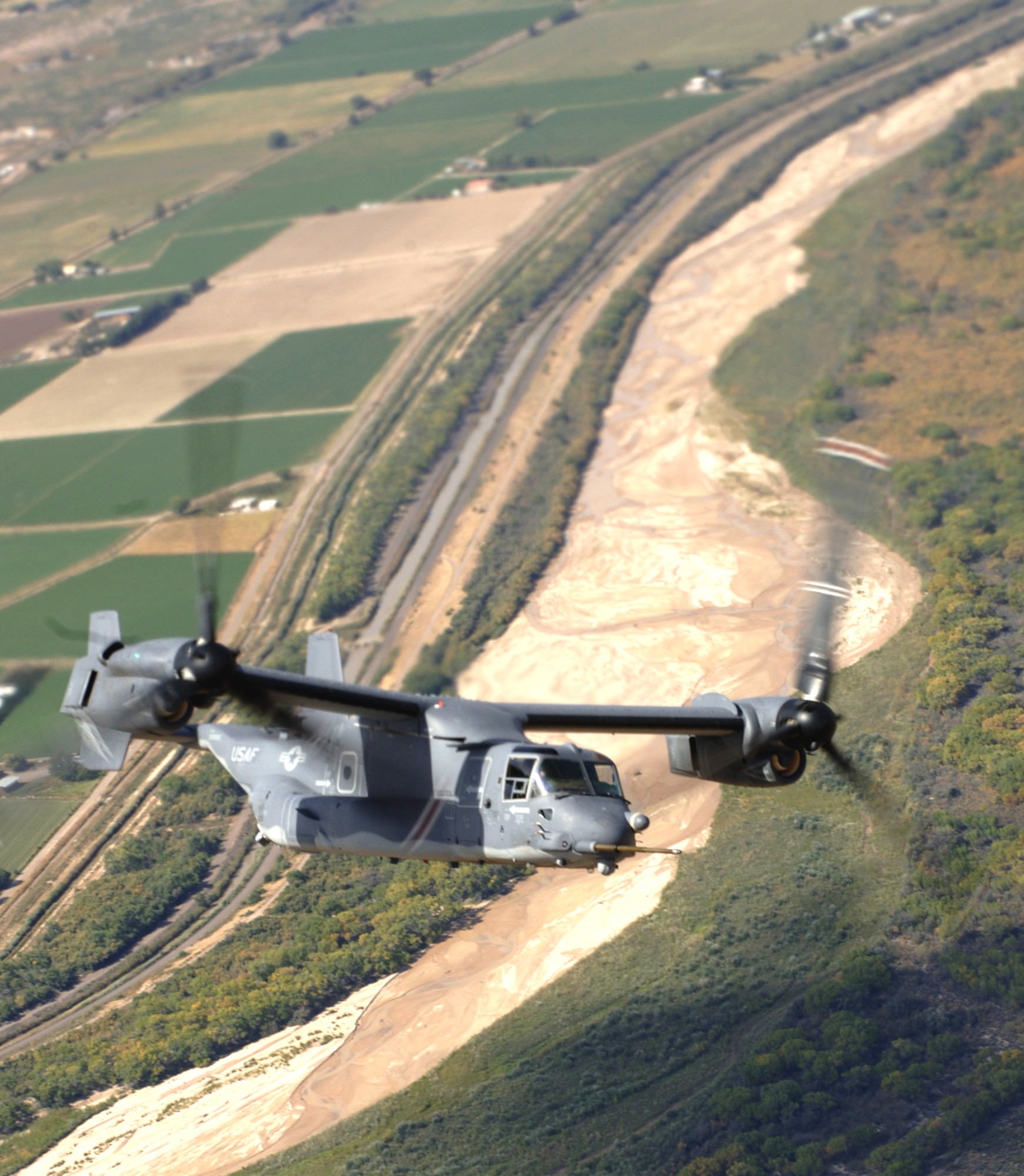 A CV-22 Osprey flies an air-refueling mission Oct. 5 over New Mexico.  The CV-22 can take off vertically and, once airborne, rotate the nacelles on each wing -- engine and prop-rotor group -- to a forward position. (U.S. Air Force photo/Tech Sgt. Cecilio M. Ricardo Jr.) 