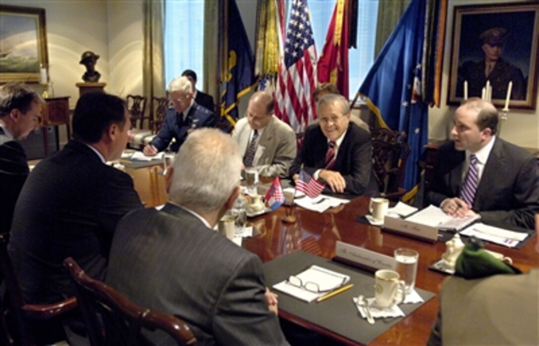 Defense Secretary Donald H. Rumsfeld, second from far right, hosts a meeting at the Pentagon, Oct. 5, 2006, with a Croatian delegation led by Croatian Minister of Defense Berislav Roncevic, second from left. The two defense leaders discussed a broad range of security issues of mutual interest. 