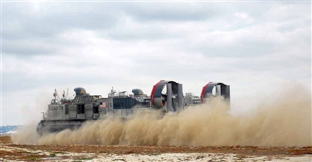 A landing craft air cushion, known as an LCAC, lands on the beach at Naval Air Station North Island, Calif., on Oct. 5, 2006.  