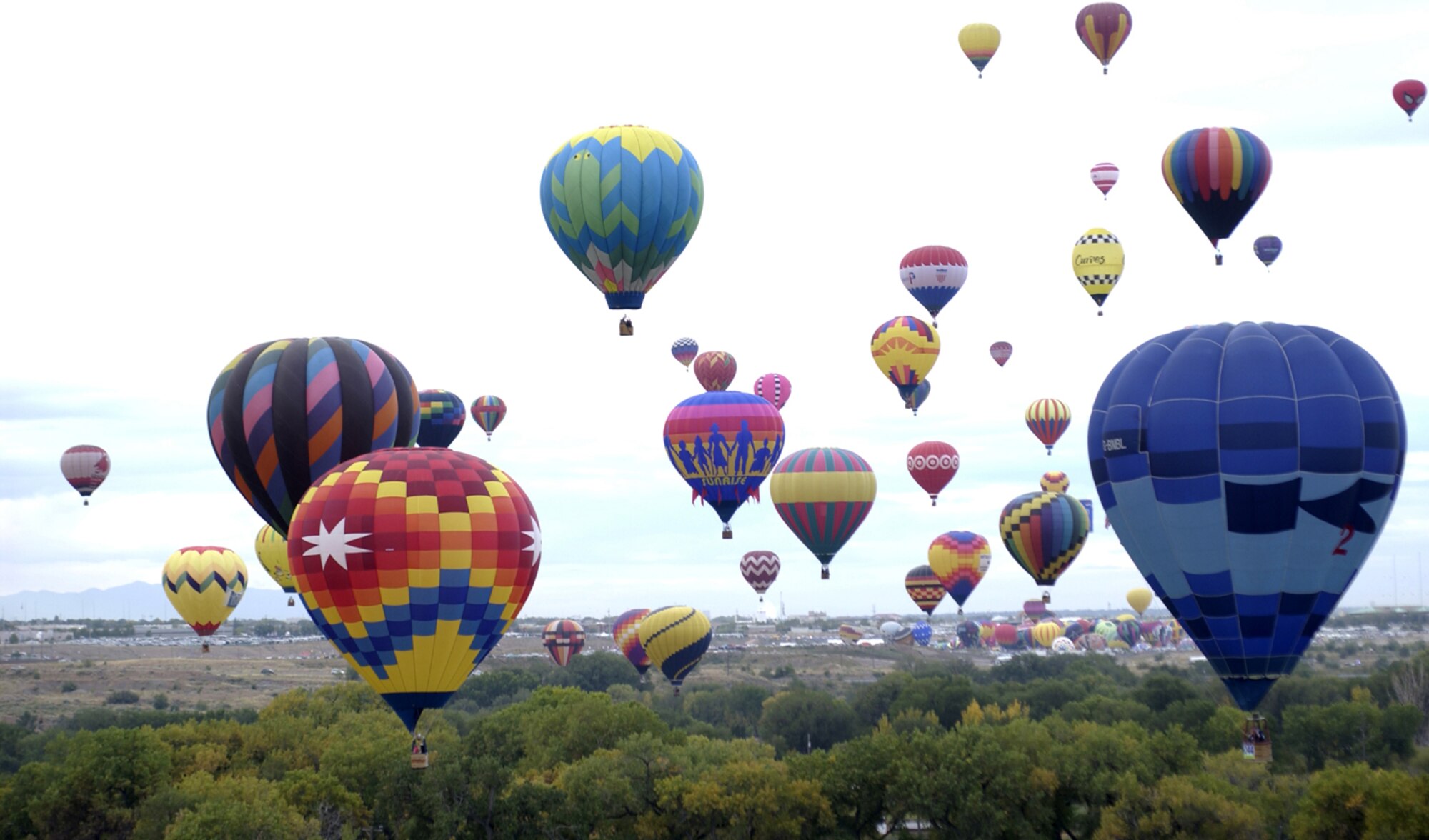 Over 700 hot air balloons took off for the first mass ascension over Fiesta Park during the Balloon Fiesta at Albuqerque, New Mexico, Oct. 7, 2006.   Balloon Fiesta is a world-renowned New Mexico attraction where several hot air balloons have been flying for thirty five years.  (US Air Force photo/Staff Sgt. Lee Hoover)