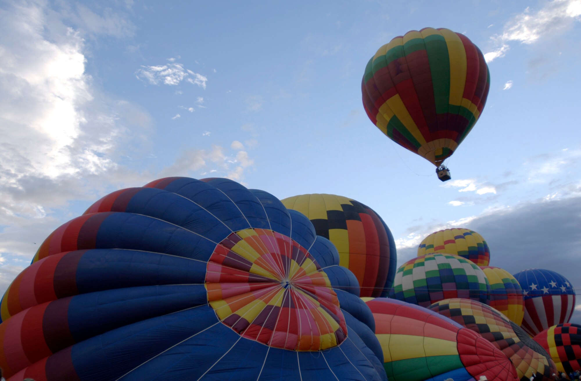 Over 700 hot air balloons took off for the first mass ascension over Fiesta Park during the Balloon Fiesta at Albuqerque, New Mexico, Oct. 7, 2006.   Balloon Fiesta is a world-renowned New Mexico attraction where several hot air balloons have been flying for thirty five years.  (US Air Force photo/Tech Sgt. Cecilio Ricardo Jr.)