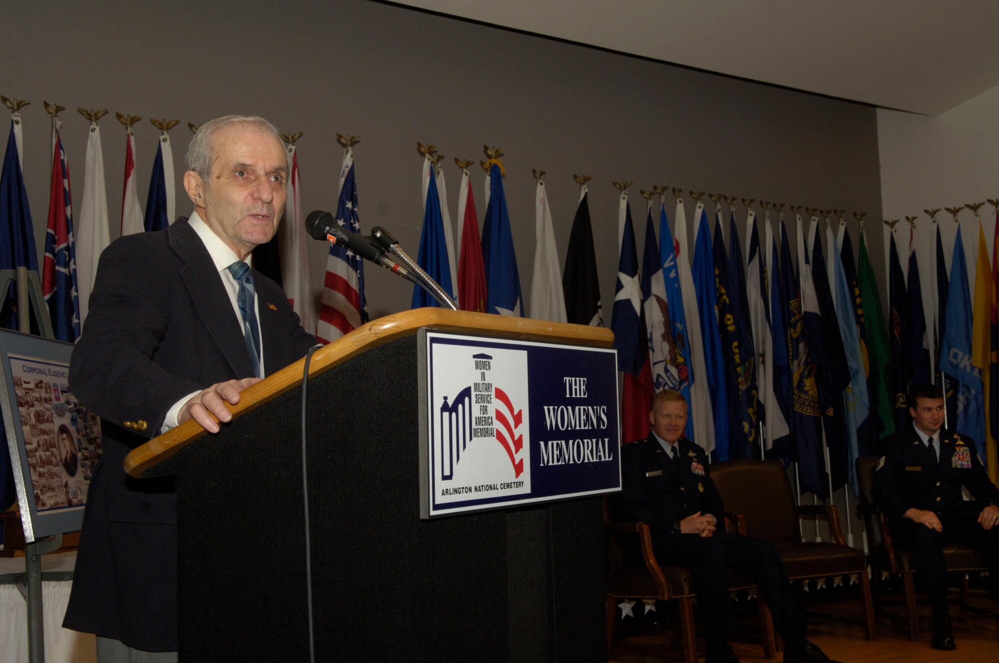 Dr. Eugene Levine speaks at an Oct. 6 ceremony in Arlington, Va., honoring his support of D-Day during World War II as a weather forecaster. Dr. Levine was presented with an American flag, a shadow box, an assortment of military coins and a 60th anniversary D-Day medallion during the ceremony, officiated by Brig. Gen. Lawrence Stutzriem, director of Air Force weather operations. (U.S. Air Force photo/Tech. Sgt. Cohen A. Young)