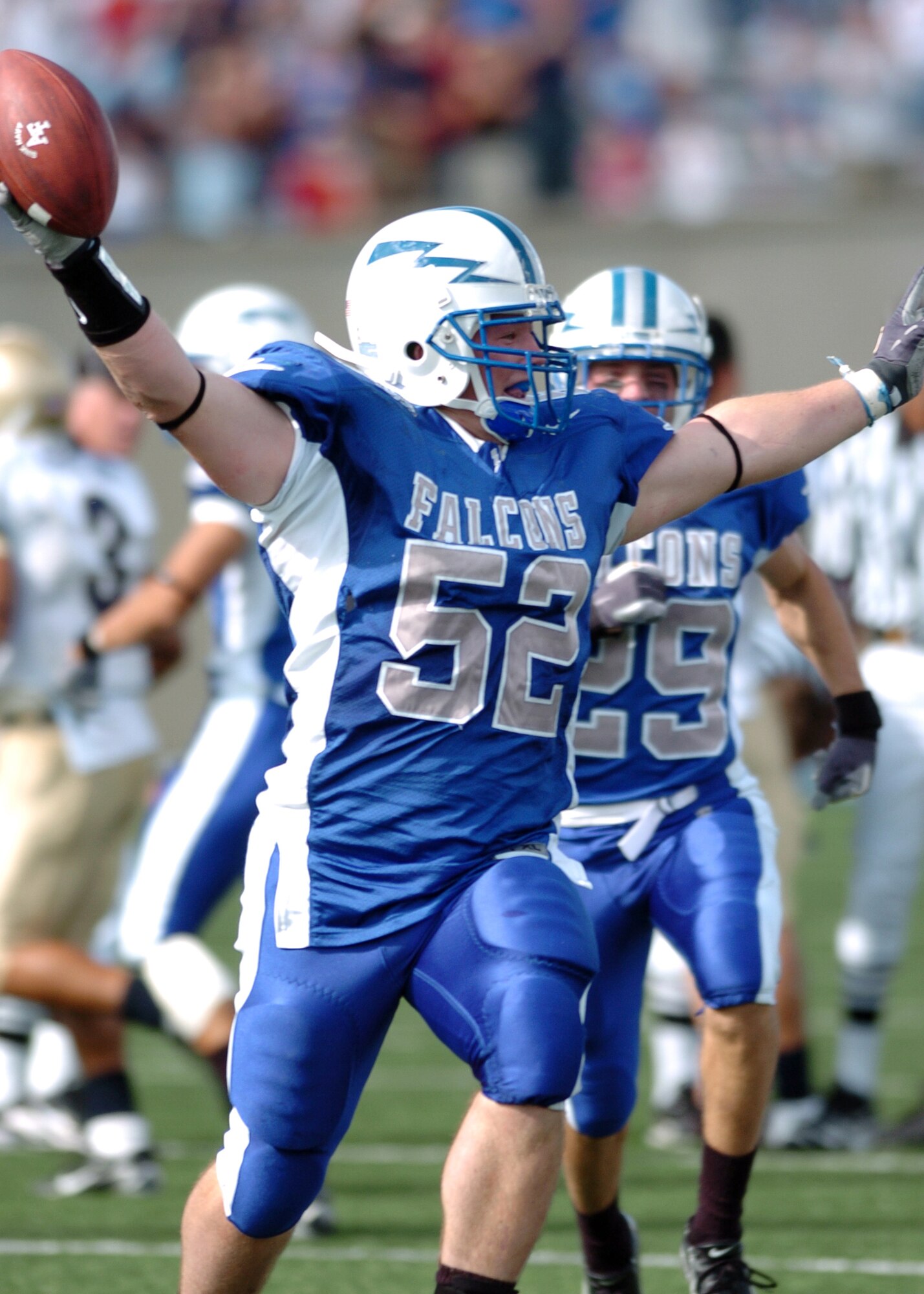 Air Force linebacker Austin Randle celebrates after recovering a Falcon on-side kick in the closing minutes of their game against Navy Saturday. The ensuing Air Force drive sputtered, however, and time ran out on the Falcons. Navy won, 24-17. (Photo by 1st Lt. John Ross)