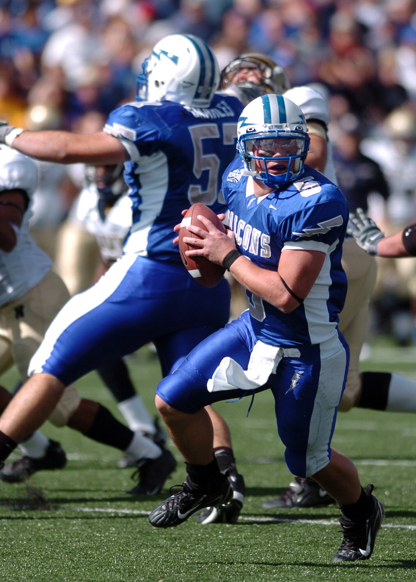 Air Force quarterback Shaun Carney rolls out to look for targets downfield Saturday. His 119 yards passing were not enough to defeat Navy, who won 24-17. (Photo by 1st Lt. John Ross)