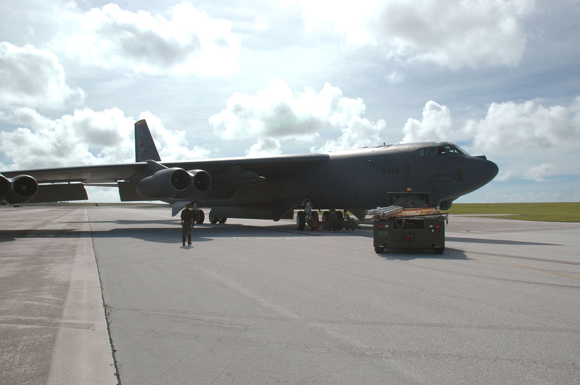 Maintainers from the 36th Expeditionary Aircraft Maintenance Squadron park a B-52 Stratofortress Sept. 21 at Andersen Air Force Base, Guam, after a mission. The squadron has achieved 100 percent mission effectiveness and 100 percent weapons release rates since arriving in September. They are deployed to Andersen AFB as part of the United States' commitment to keeping a continuous bomber presence in the Pacific region. (U.S. Air Force photo/Staff Sgt. Eric Petosky) 