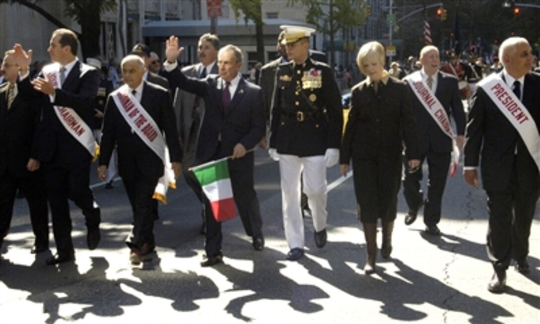U.S. Marine Corps Gen. Peter Pace, chairman of the Joint Chiefs of Staff, his wife, Lynne, and the Mayor of New York City, Michael Bloomberg, march in the Columbus Day Parade along Fifth Avenue in New York City, Oct. 9, 2006. Pace, who was born in Brooklyn to Italian-American parents, was selected by the Columbus Citizens Foundation to be the Grand Marshal for this event.