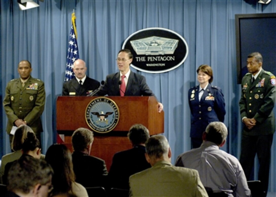 Under Secretary of Defense for Personnel and Readiness David S. Chu conducts a press briefing in the Pentagon on Oct. 10, 2006 to talk about the most recent figures on recruiting and retention in the U.S. armed services.  Joining Chu are the senior officers responsible for recruiting from each of the services.  Left to right are:  Deputy Commandant for Manpower and Reserve Affairs Maj. Gen. Ronald S. Coleman of the U.S. Marine Corps, Commander of the Navy Recruiting Command Rear Adm. Joseph F. Kilkenny; Commander, Air Force Recruiting Service Brig. Gen. Suzanne M. Vautrinot, and Commander of the U.S. Army Recruiting Command Maj. Gen. Thomas P. Bostick.  